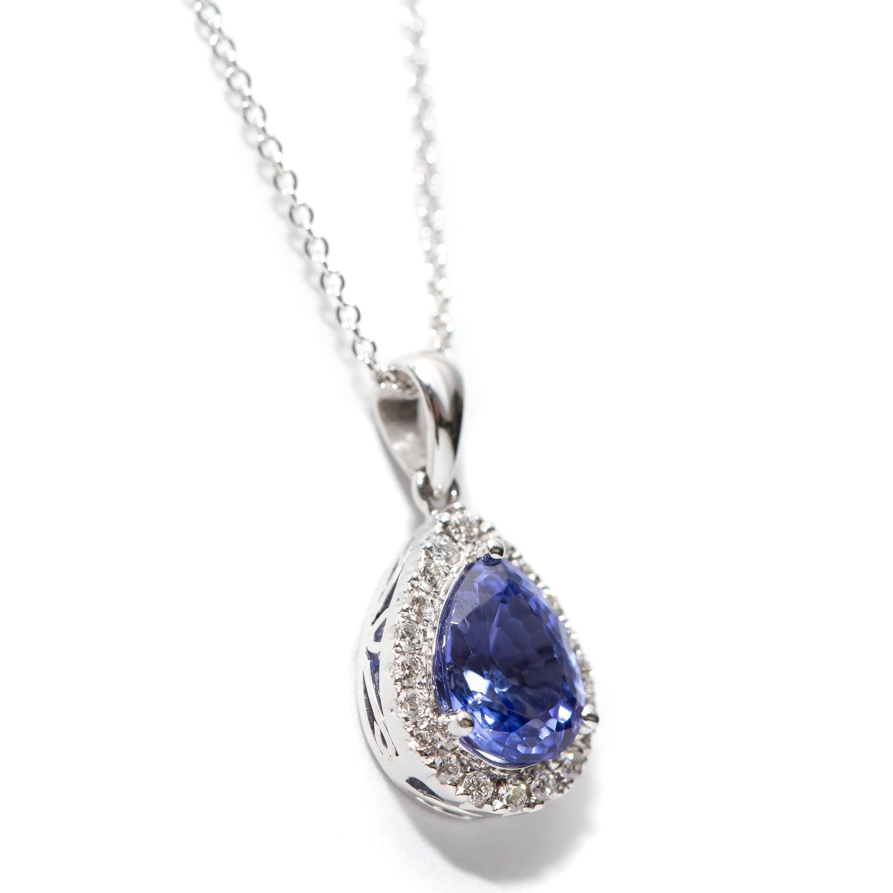 A Gorgeous 1.25 Carat Pear Shaped Tanzanite Halo Pendant Necklace featuring 0.30 Carat of White Round Brilliant Diamonds Set in 18 Karat White Gold. Other chain sizes are available upon request. British Hallmarked. 

This pendant can be made bespoke