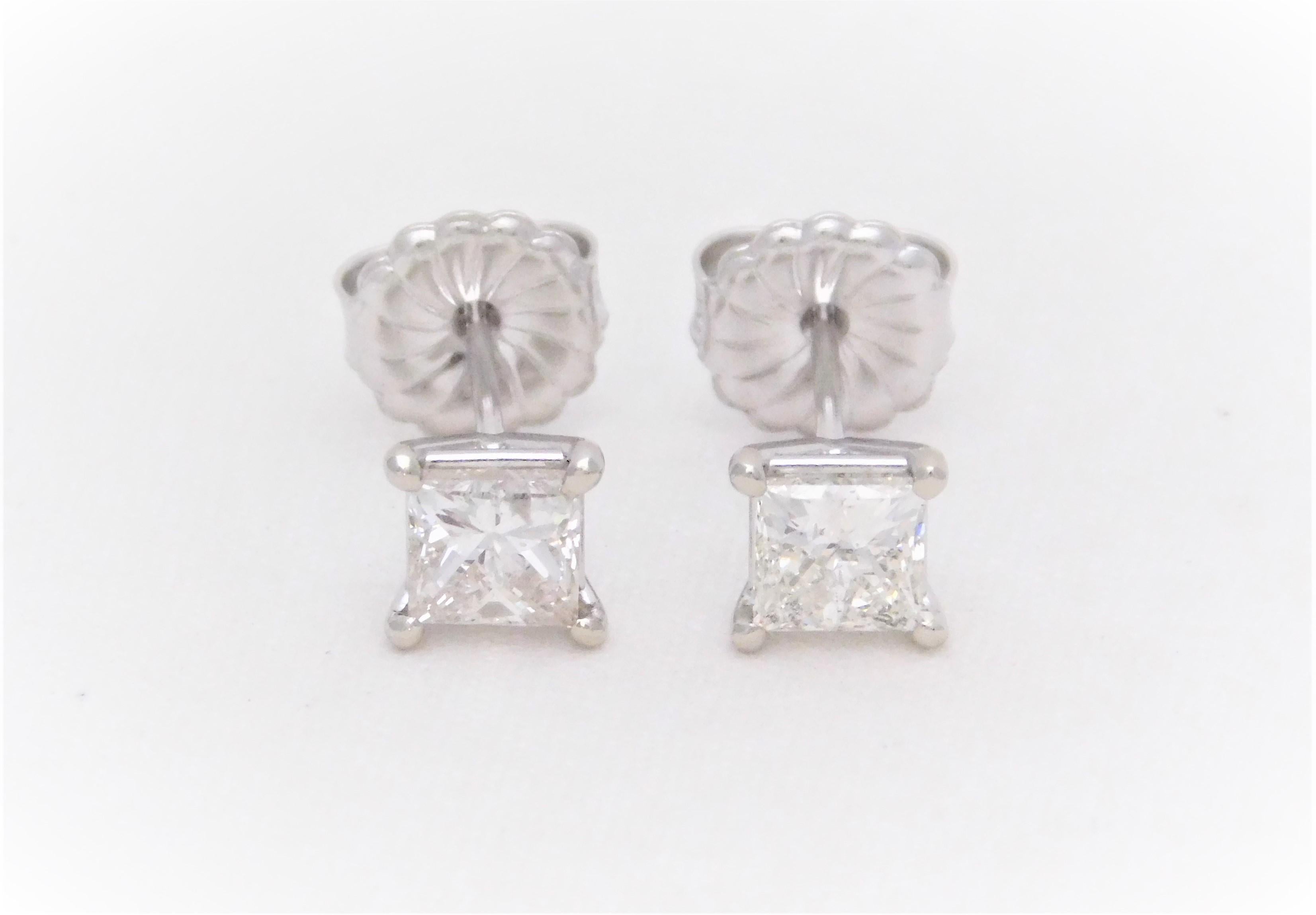 1.26 Carat Princess-Cut Diamond Stud Earrings in 18k White Gold
Brand New and never worn.  These bright and sparkling stud-style earrings have been crafted in solid 18k White Gold.  Each earring has been masterfully jeweled, in a 4-prong cocktail