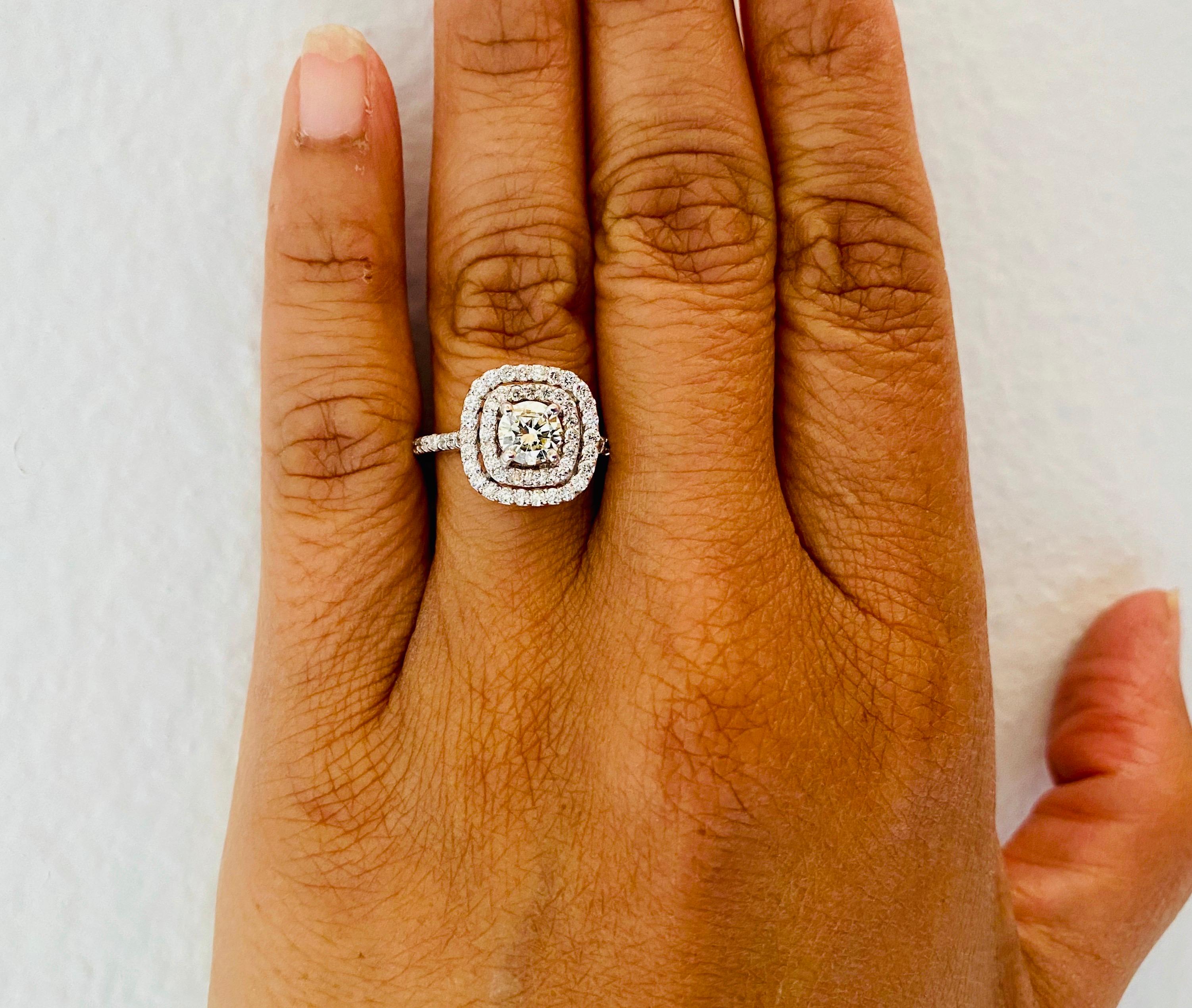 Women's 1.26 Carat Round Cut Diamond 14 Karat White Gold Halo Engagement Ring For Sale