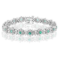 Bracciale a fiore con smeraldo rotondo e diamante da 1,26 carati in oro bianco 14K