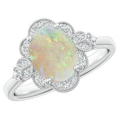 1.26 CTW Victorian Style Oval Opal and Diamond Halo Ring in Silver for Women
