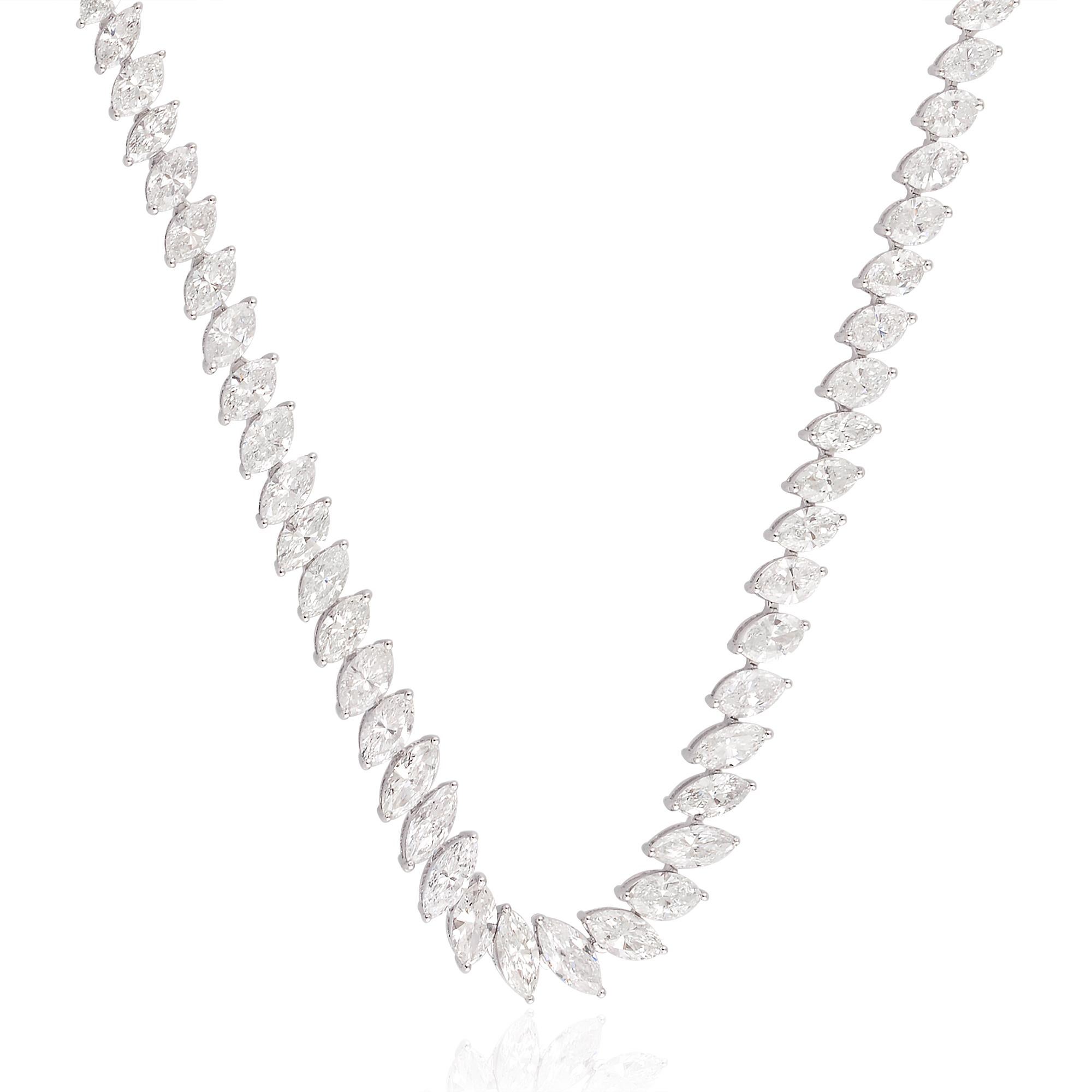This 12.60 Carat SI Clarity HI Color Marquise Diamond Necklace is a true statement piece that exudes elegance and grandeur. Whether worn for a special occasion or to add a touch of glamour to everyday attire, it is guaranteed to capture attention