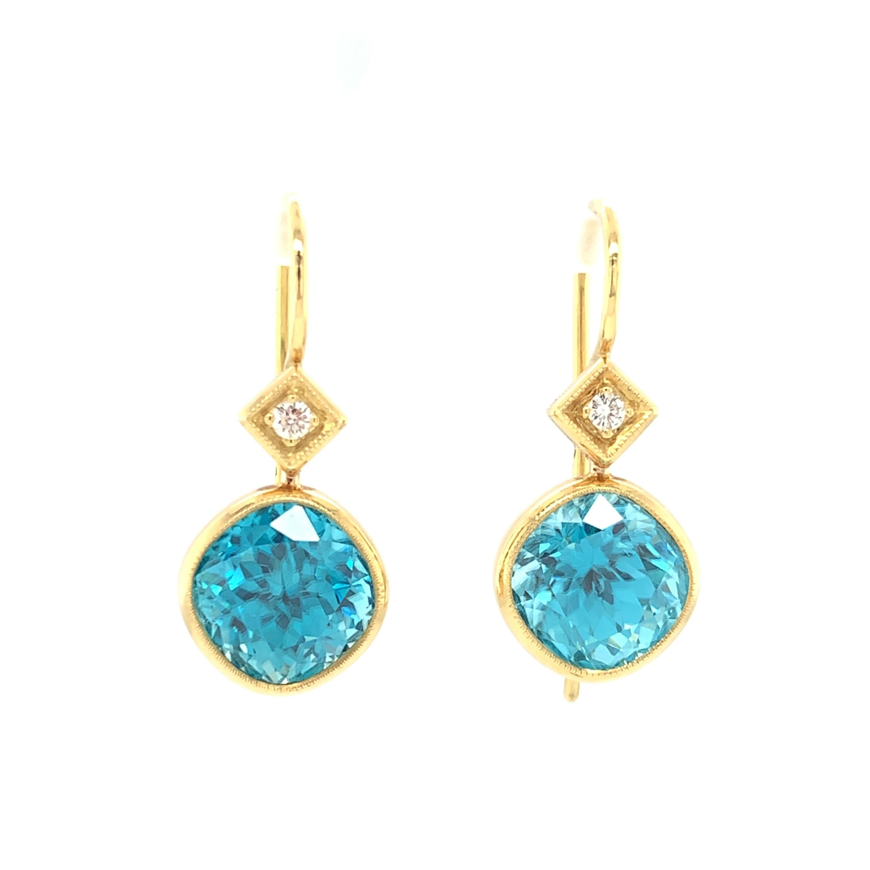These neon-blue, turquoise color, natural zircons are sure to light up your face and help you sparkle day and night! The bezel setting and elegant drop design are a flattering and easy-to-wear European style; a real 