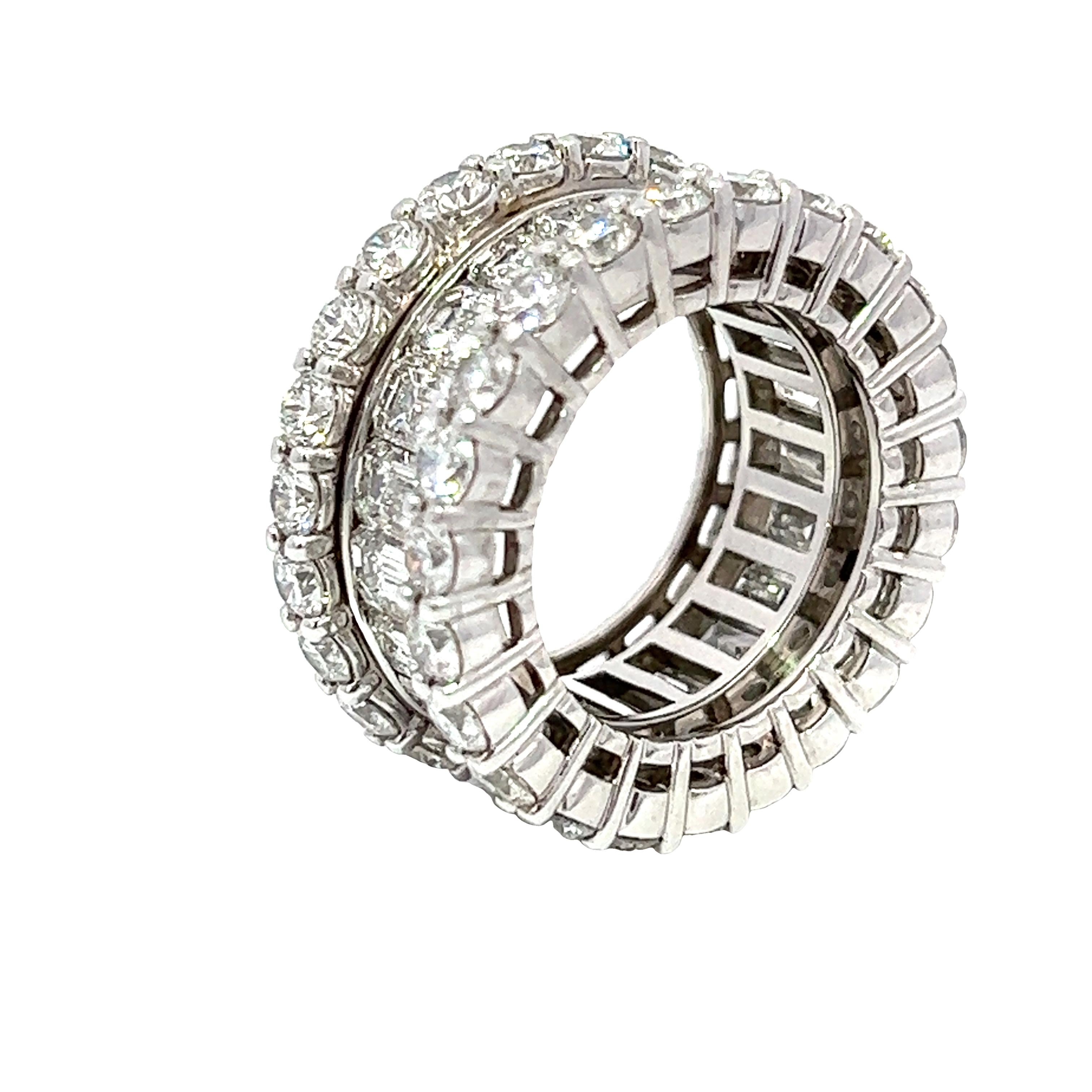 We present our meticulously crafted diamond eternity ring, the epitome of elegance and sophistication that defines luxury. This ring weighs 19.37 Grams and carries 5.50CT of Round Diamonds, F-G Color, and VS clarity. Then, it follows with 7.10CT in
