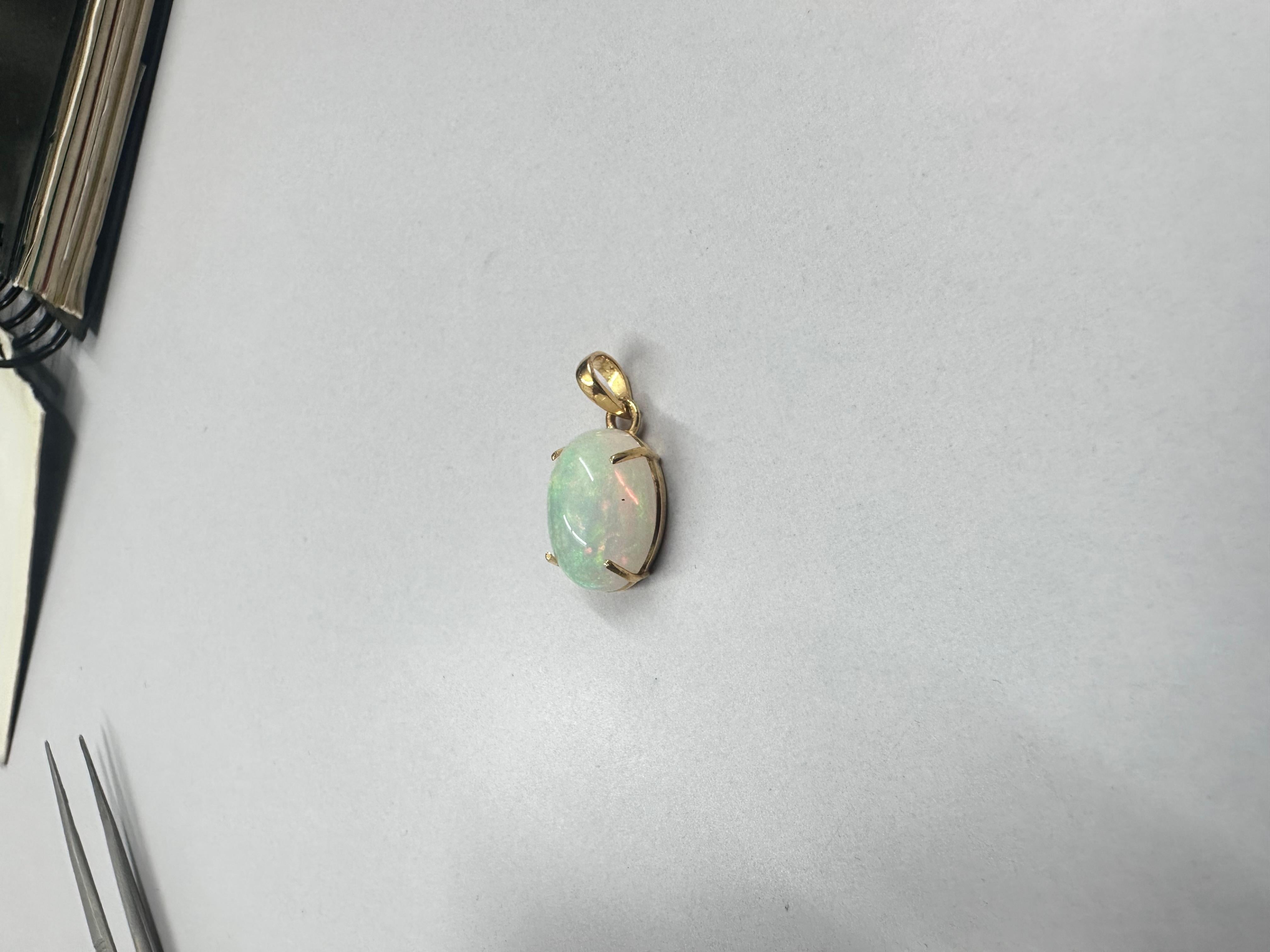 12.62ct Ethiopian opal stone in 14k yellow gold for pendant For Sale 2