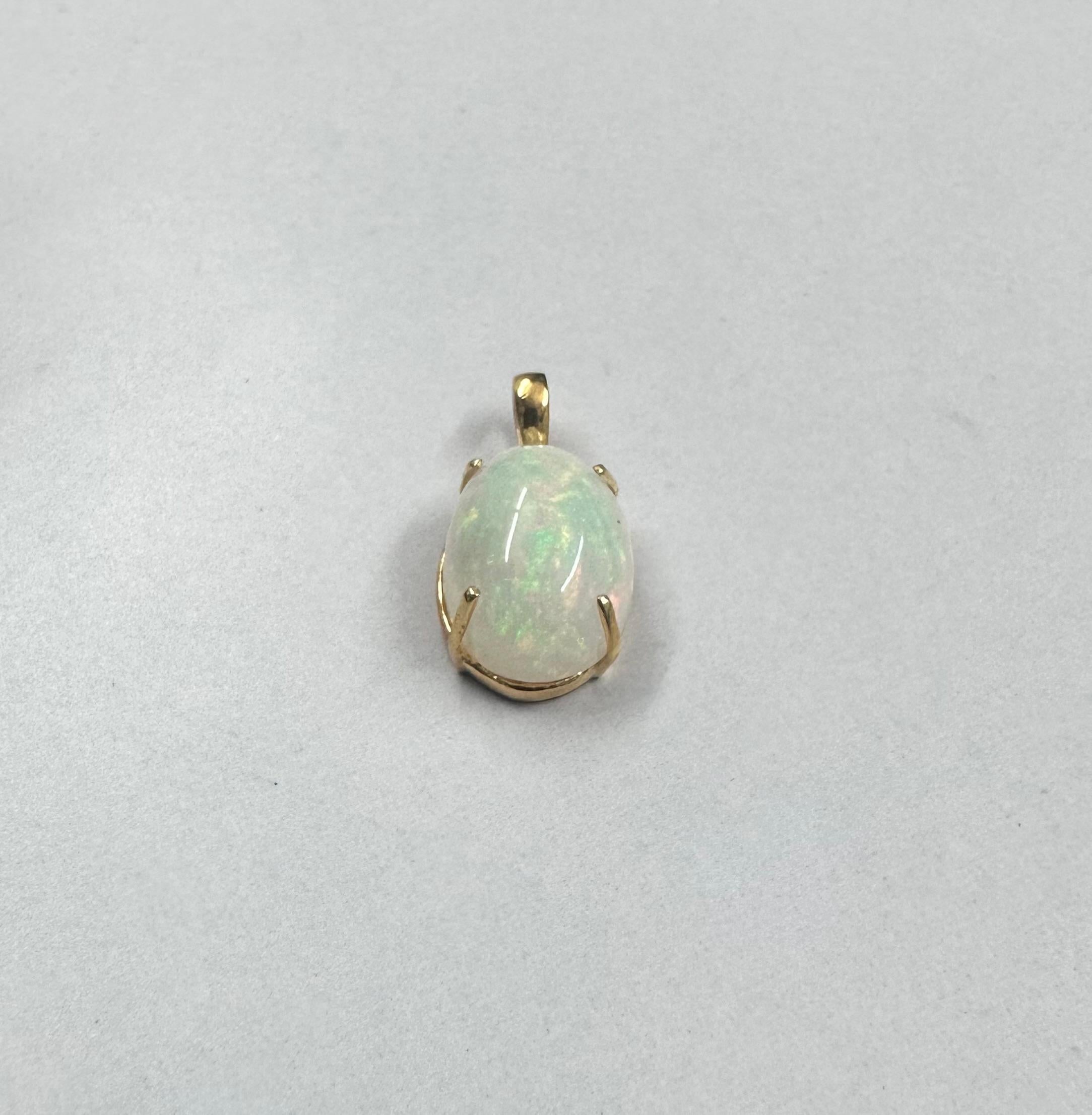 12.62ct Ethiopian opal stone in 14k yellow gold for pendant For Sale 3