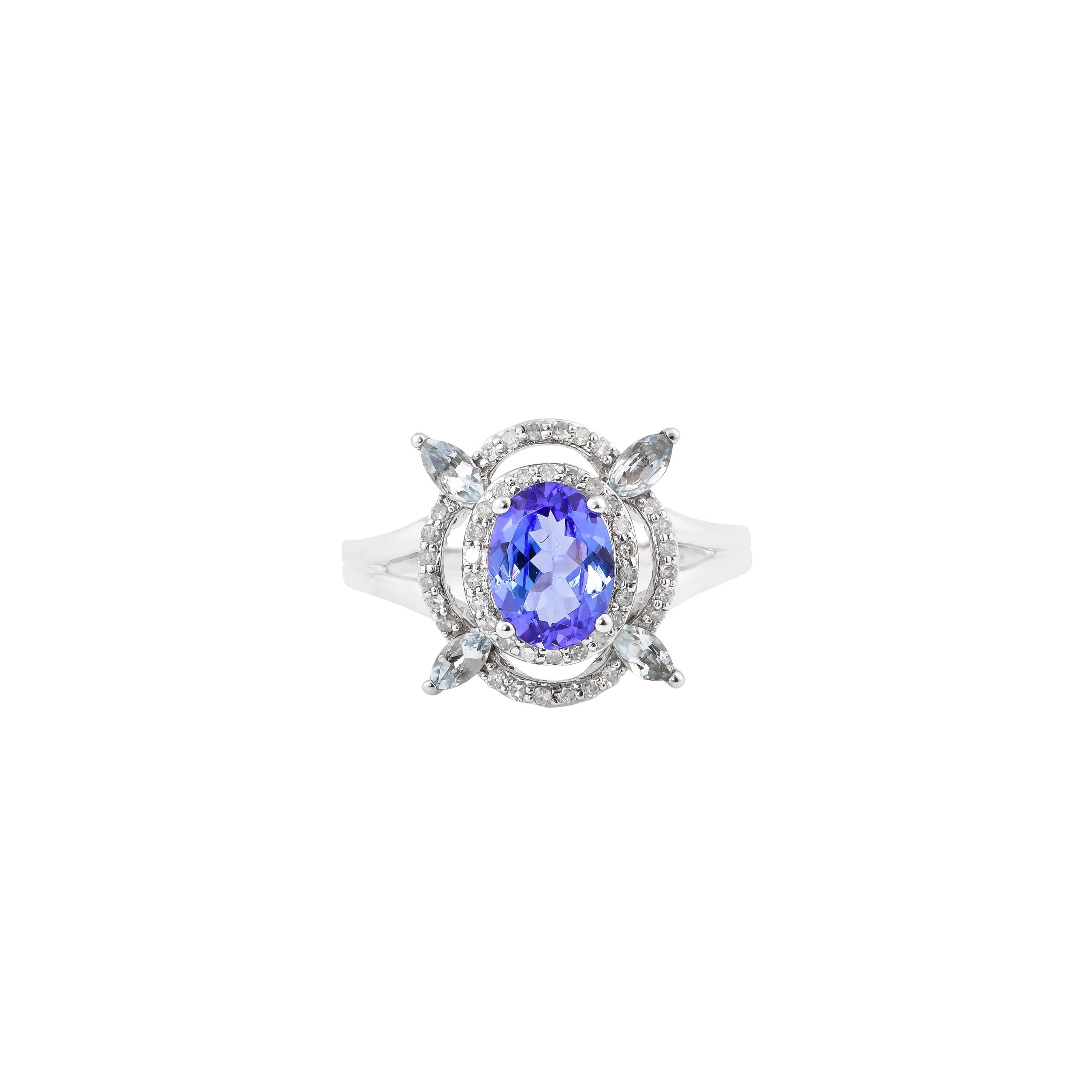 Contemporary 1.264 Carat Tanzanite Ring in 10 Karat White Gold with Aquamarine and Diamond. For Sale