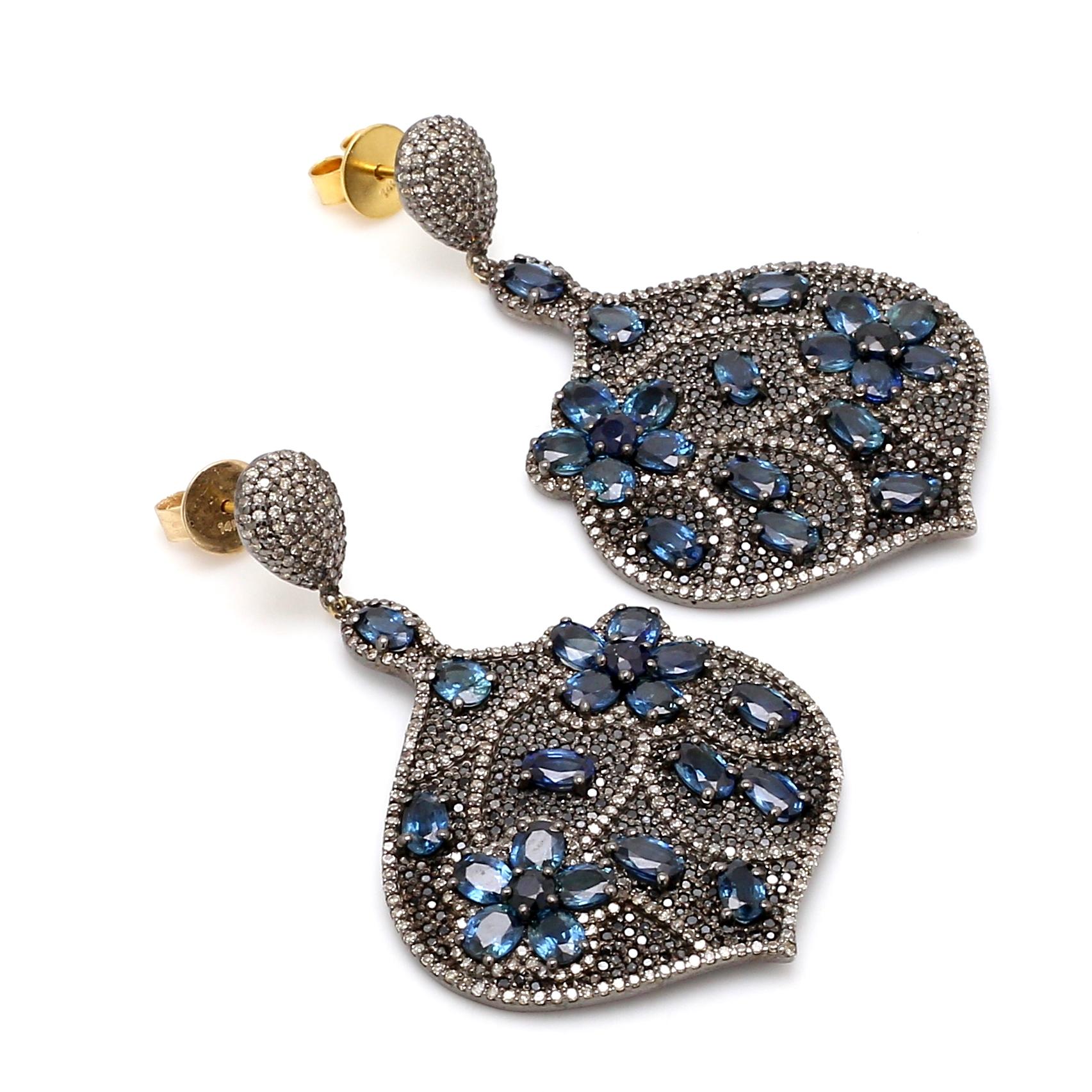 12.68 Carat Blue Sapphire and Diamond Dangle Earrings in Victorian Style

This Victorian period articulate art-deco style deep blue sapphire and diamond earring is strikingly gorgeous. The sensational outward fancy pear shape is covered with the