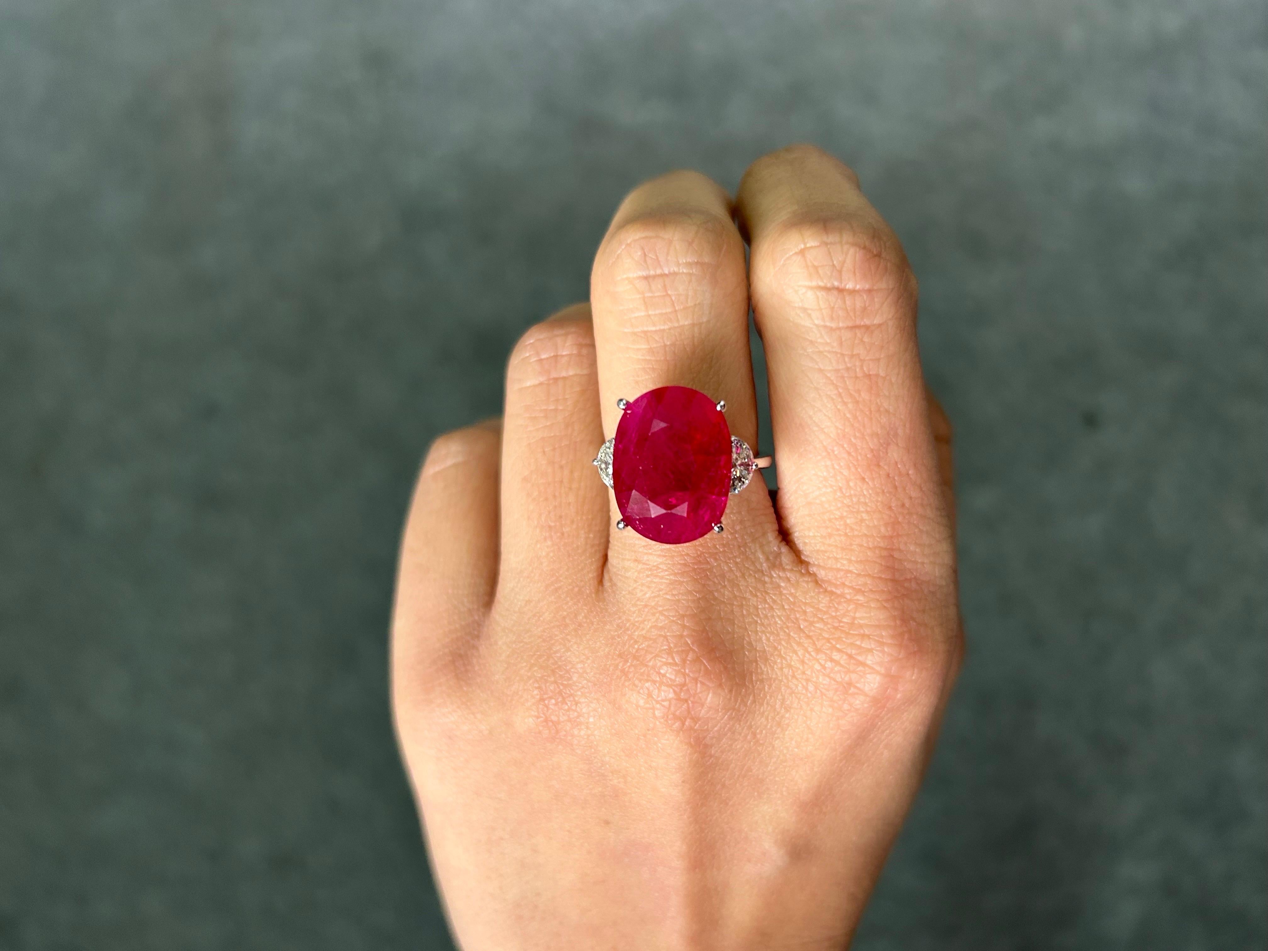 Oval Cut 12.68 Carat Burma Ruby Three Stone Engagement Ring For Sale