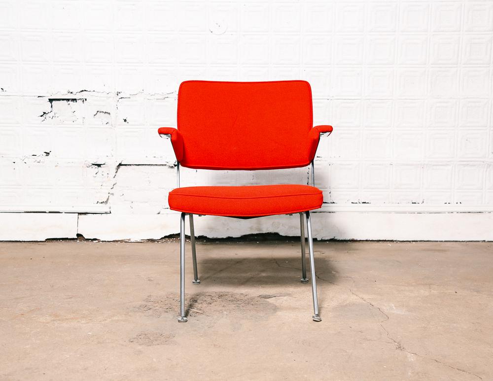 Amazing lounge chair designed by the iconic Dutch designer A.R. Cordemeijer.

Vintage red wool fabric and black leather back on nickel-plated steel base.

Newly upholstered.