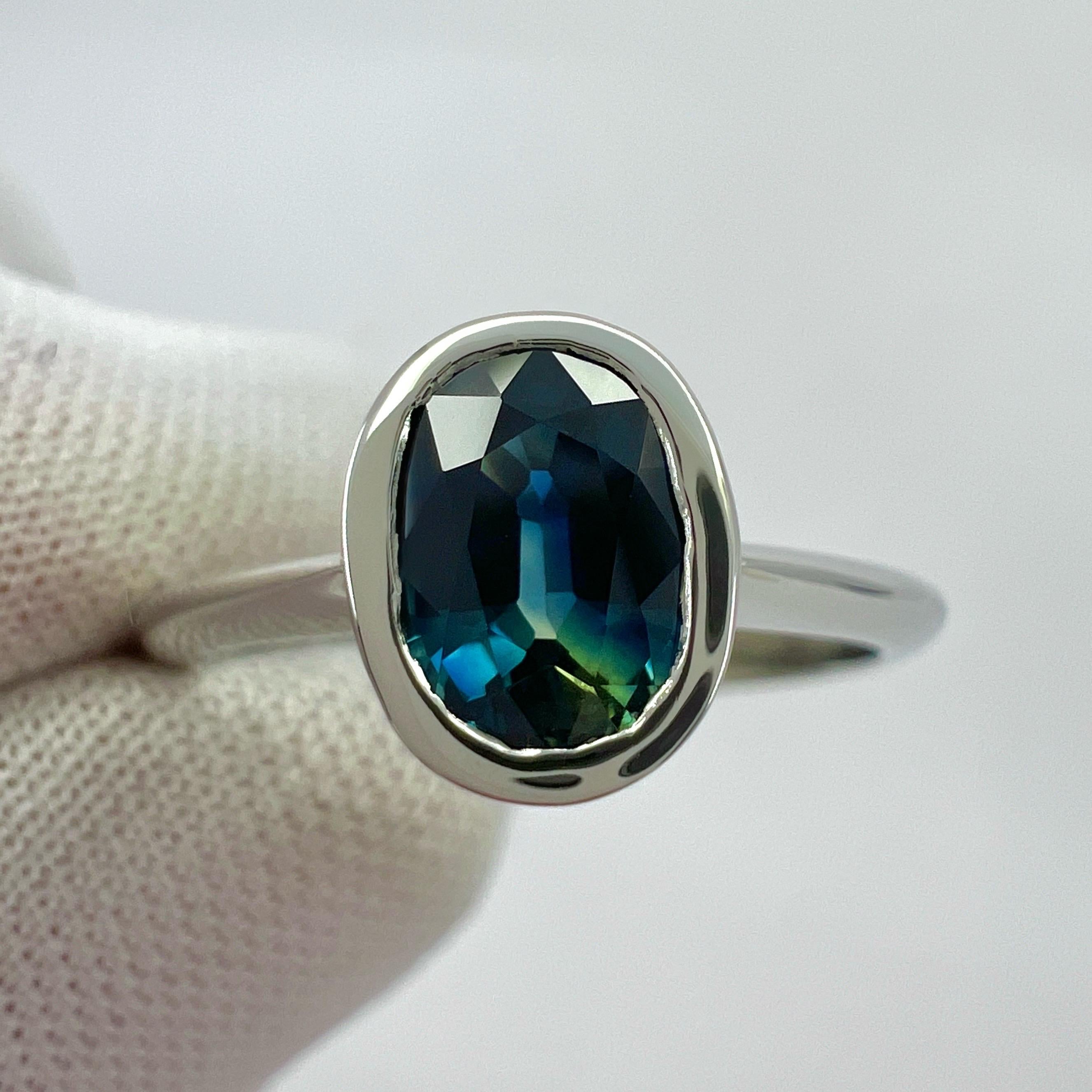 Natural Bi Colour Deep Blue Green Australian Sapphire 950 Platinum Rubover Bezel Solitaire Ring.

1.26 Carat Australian sapphire with a stunning deep blue yellow-green bi colour effect. Predominantly deep blue but with flashes of green, very rare