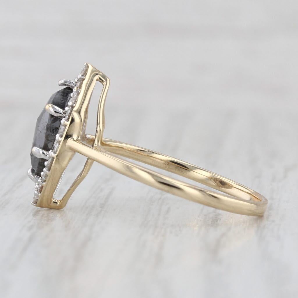 Gemstone Information:
- Natural Diamond -
Carats - 0.90ct 
Cut - Marquise
Color - Gray
Please note there are surface reaching inclusions

- Natural Diamonds -
Total Carats - 0.36ctw
Cut - Round Brilliant
Color - H - I
Clarity - SI2 - I2

Metal: 14k