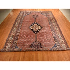 Tapis zoroastrien ancien en laine pure, noué à la main, de couleur corail foncé, de dimensions 12'6" x 19'6", à usure uniforme