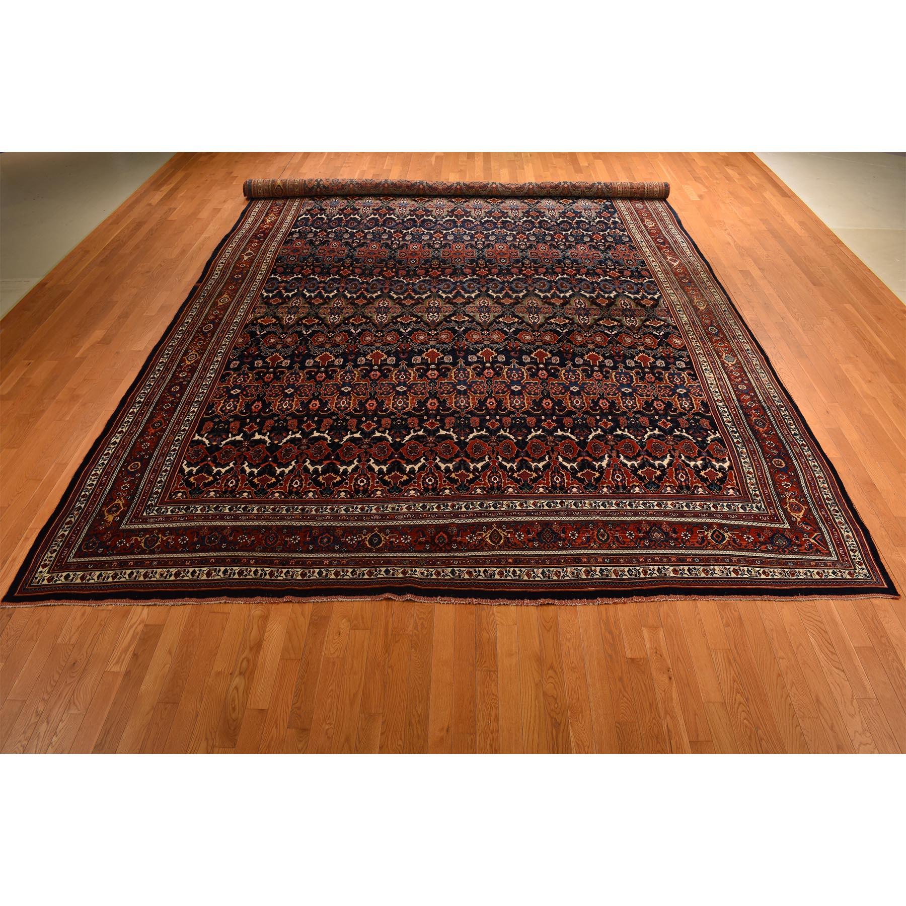 Midnight Blue, Antique Persian Bijar, Densley Woven with Fine Wool, Good Condition, Repetitive All Over Tribal Guls Design, Hand Knotted, Oversized, Oriental Rug
Primary materials: Wool
Latex: No
Pile height: 0.25 Inches
Style: Traditional
Primary