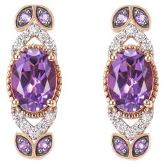 Sunita Nahata Amethyst 1.27 Karat. Ohrstecker aus 14KRG mit weißem Diamanten.