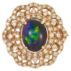 1.27 Carat Australian Lightning Ridge Black Opal Ring Made in 18K Rose Gold