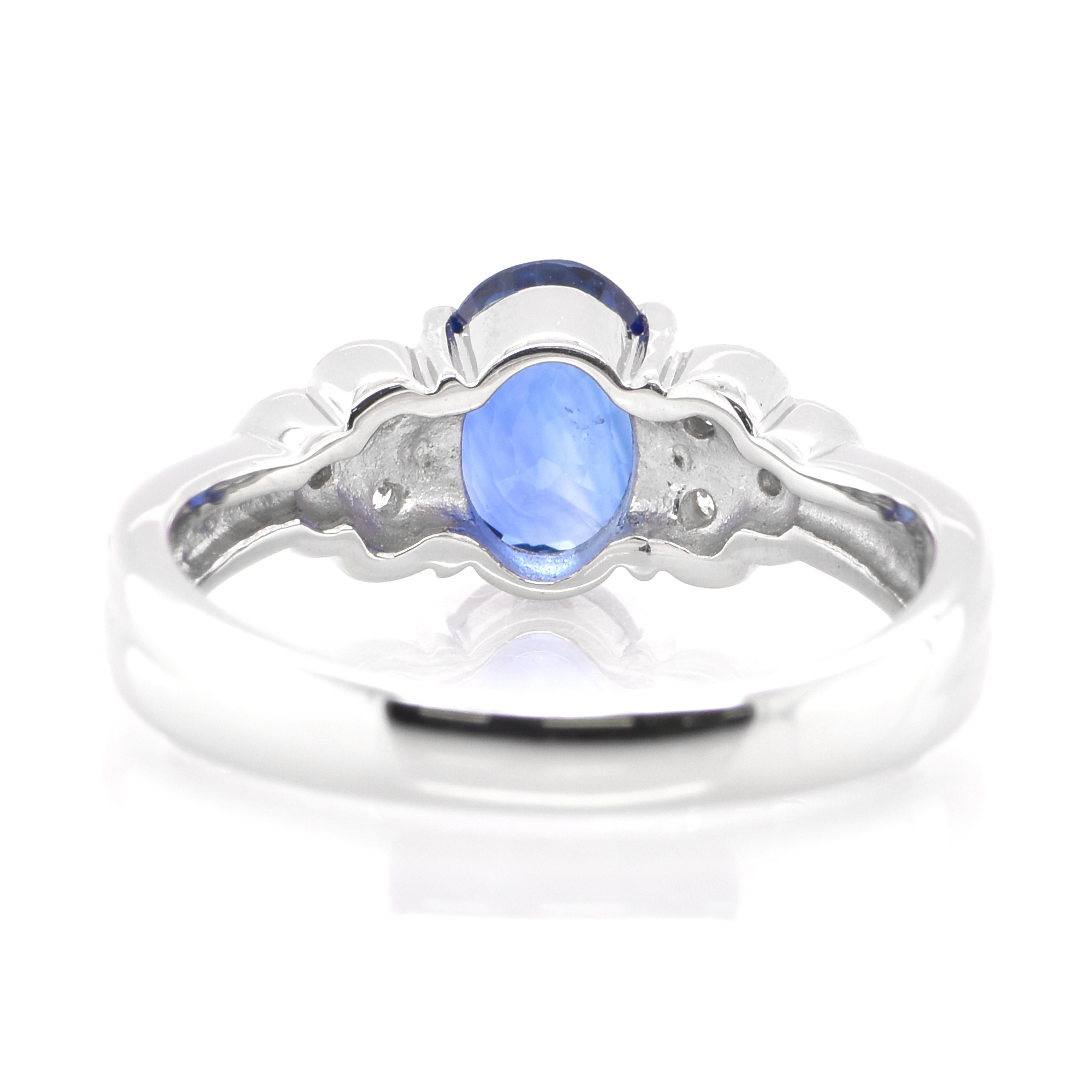 Oval Cut 1.27 Carat Natural Blue Sapphire and Diamond Ring Made in Platinum For Sale