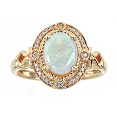 1.27 Carat Natural Opal and Diamond 14 Karat Yellow Gold Ring