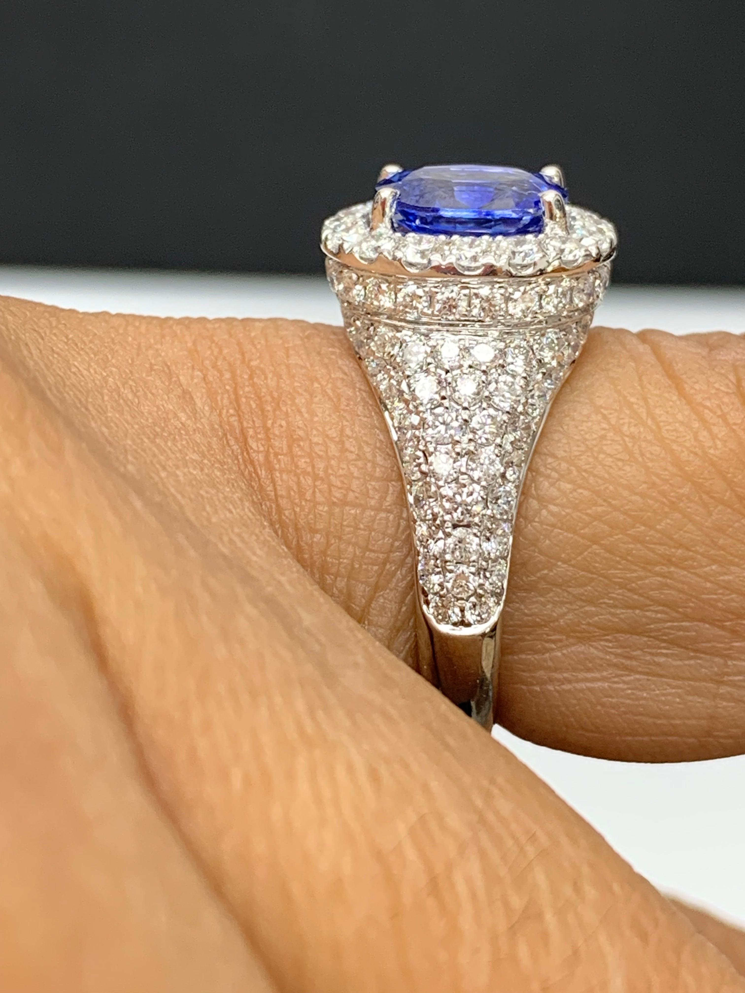 1.27 Carat Oval Cut Blue Sapphire and Diamond Fashion Ring in 18K White Gold For Sale 7