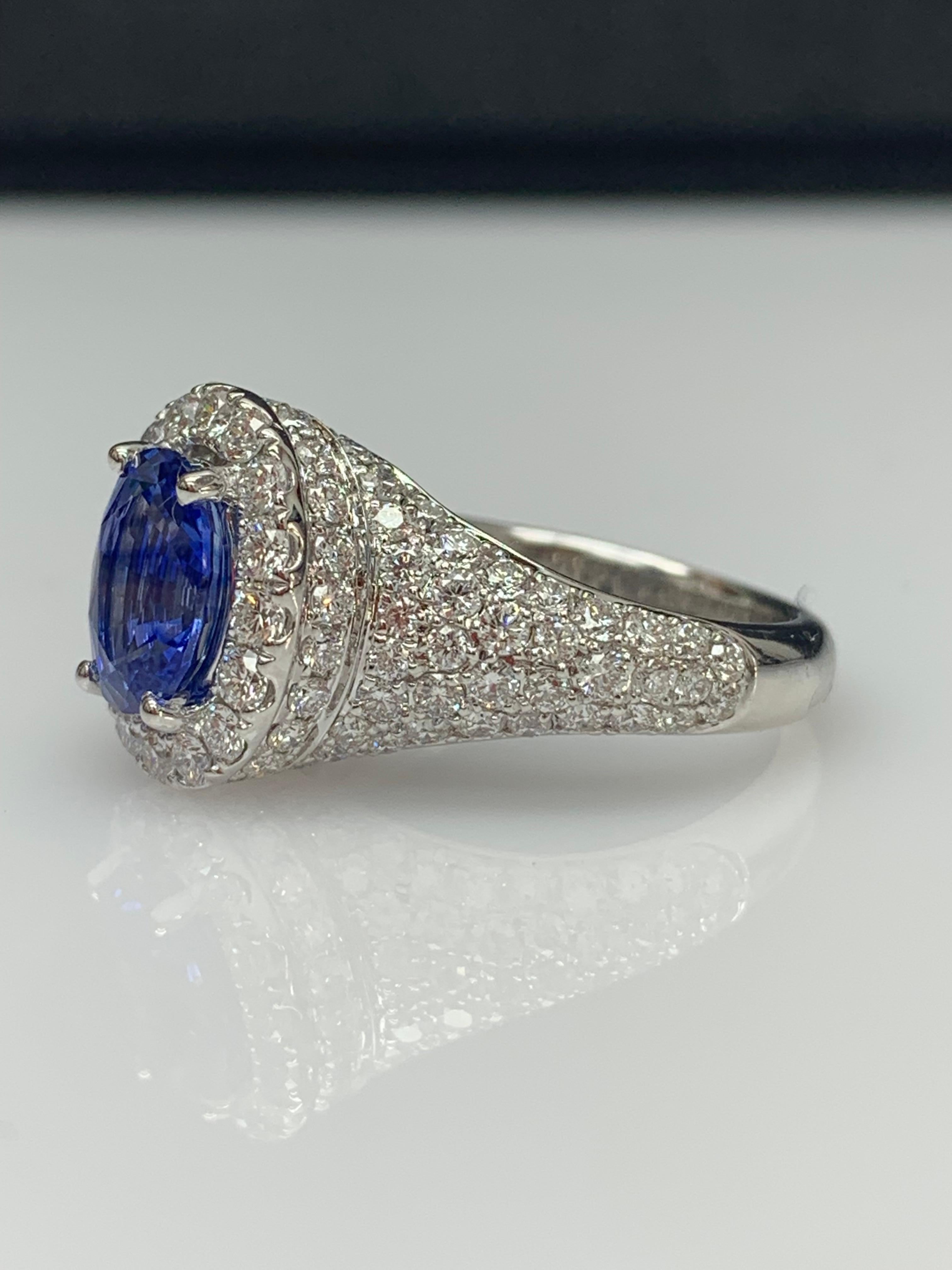 1.27 Carat Oval Cut Blue Sapphire and Diamond Fashion Ring in 18K White Gold In New Condition For Sale In NEW YORK, NY