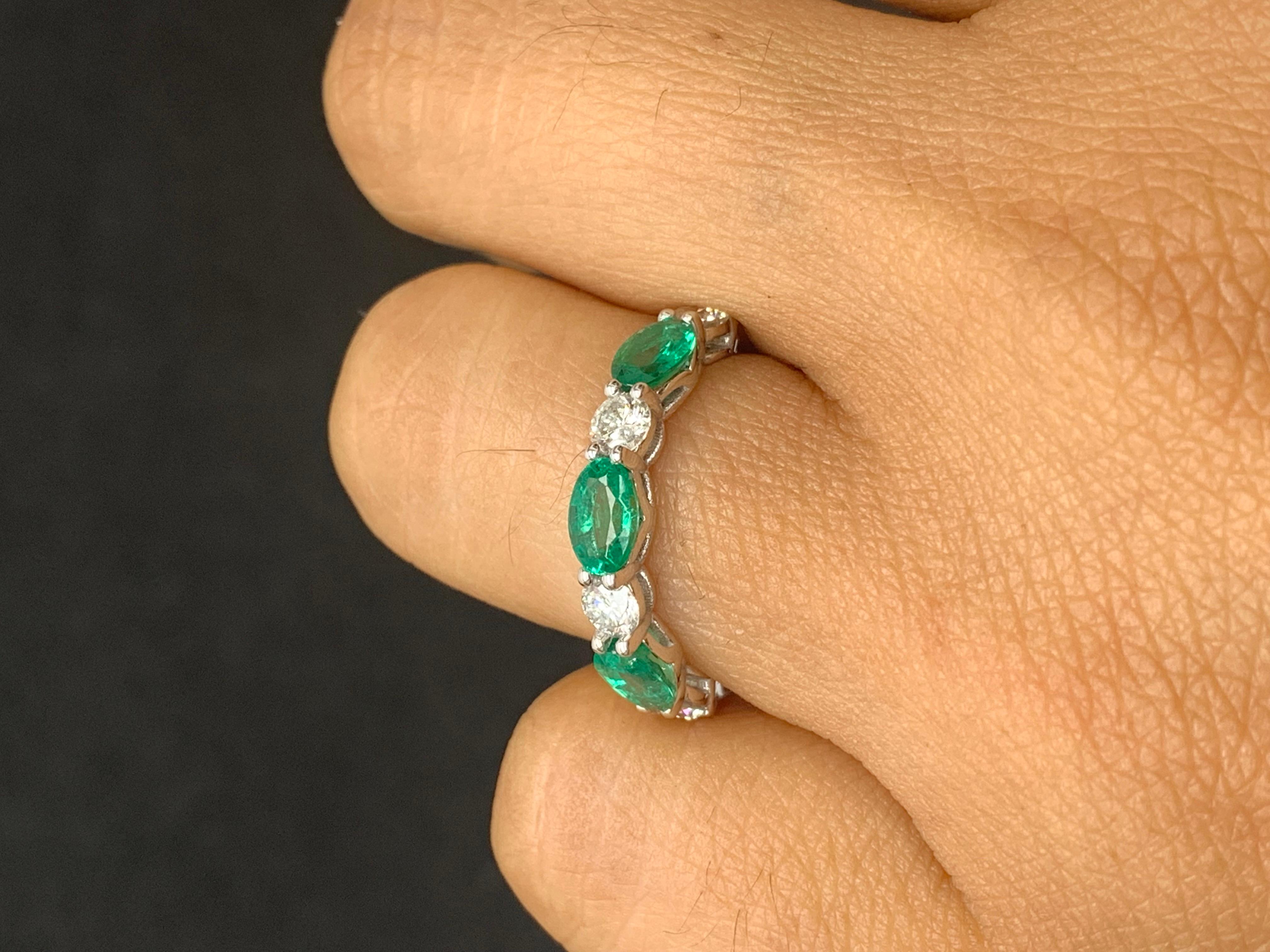 Contemporary 1.27 Carat Oval Cut Emerald and Diamond Band in 14K White Gold For Sale