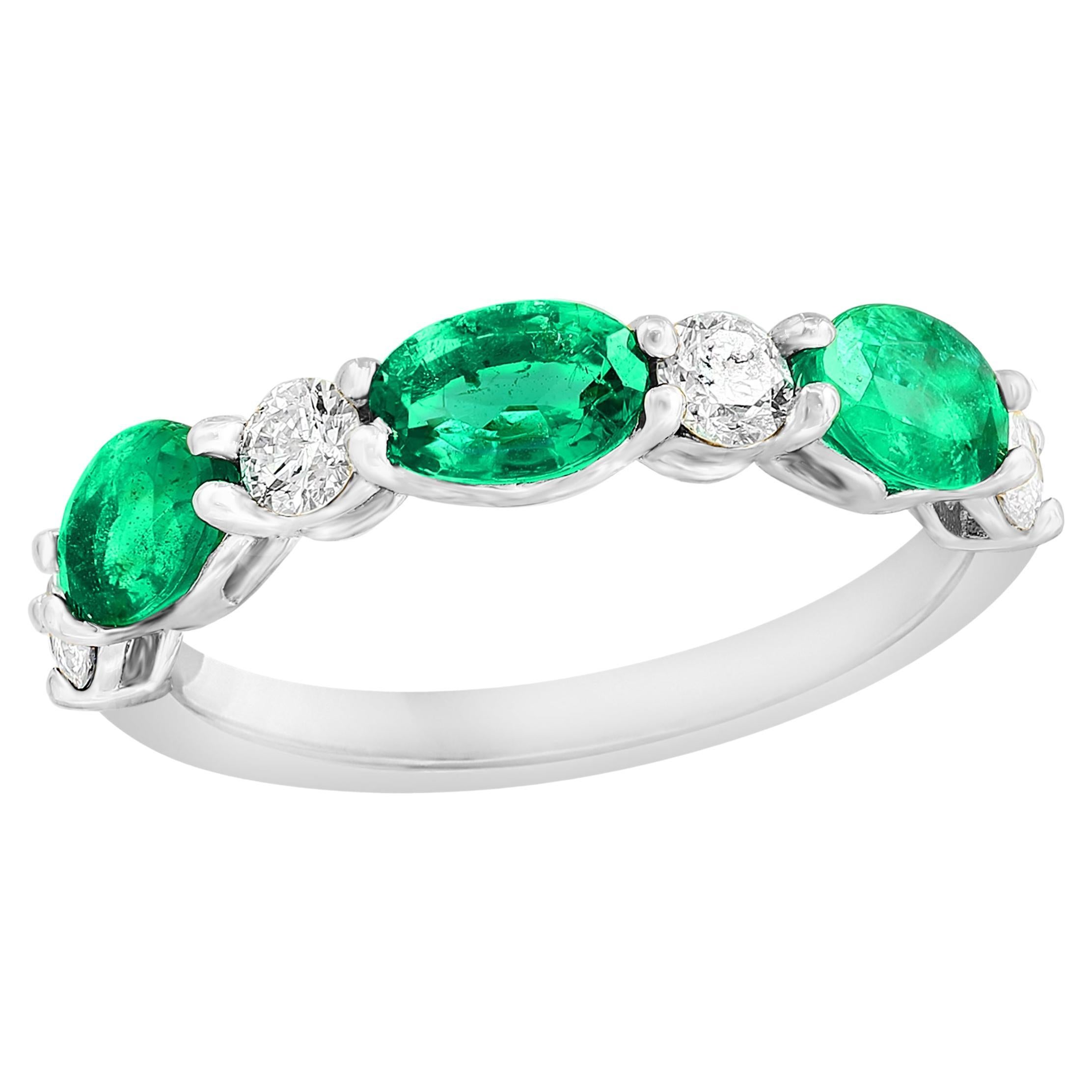 1.27 Carat Oval Cut Emerald and Diamond Band in 14K White Gold For Sale