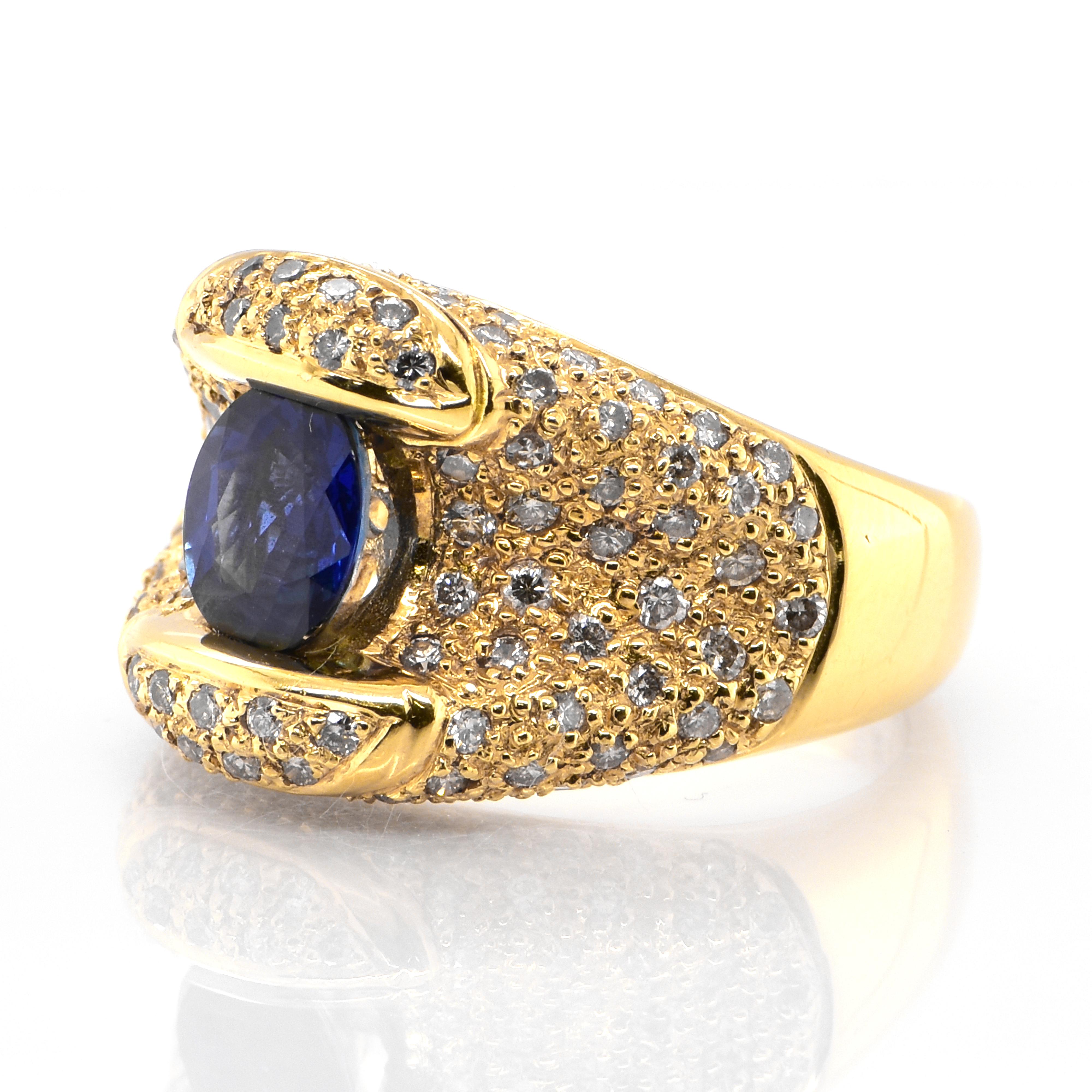 A beautiful ring featuring 1.27 Carat Natural Blue Sapphire and 1.00 Carats Diamond Accents set in 18 Karat Yellow Gold. Sapphires have extraordinary durability - they excel in hardness as well as toughness and durability making them very popular in