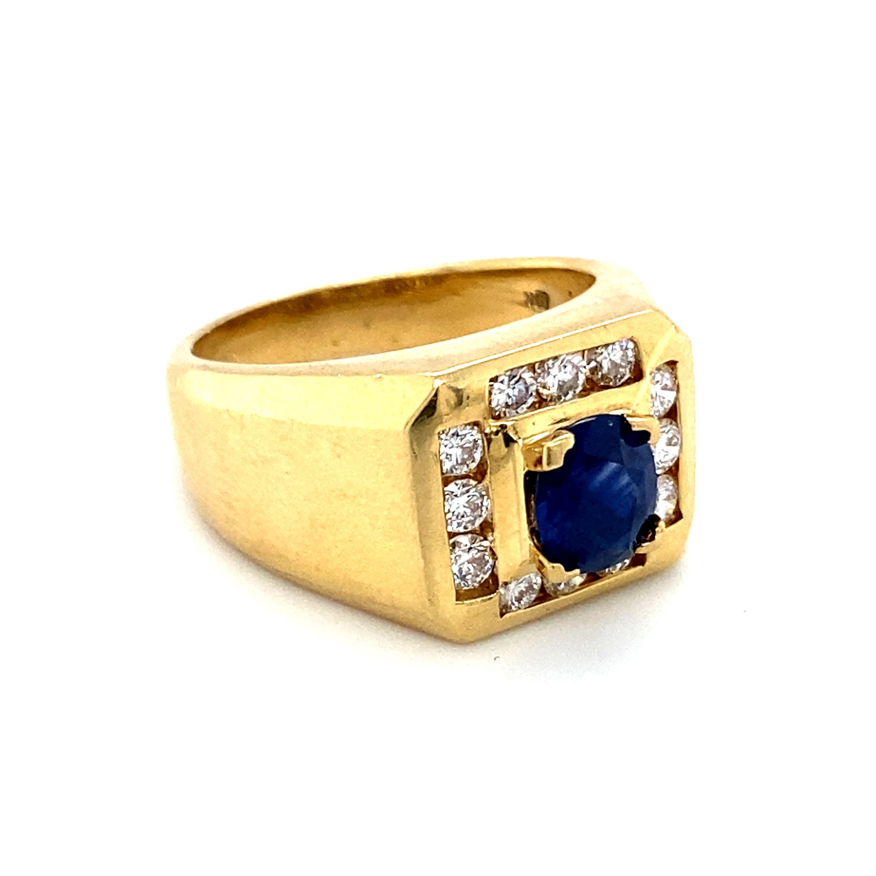 Item Details:
Size: 9.5, can be resized
Metal: 18 Karat Yellow Gold
Weight: 17.4 grams
Finger to top of stone measures 8.5 millimeters

Sapphire Details:
Carat: 1.0 carat total weight
Cut: Oval
Color: Rich Royal Blue

Diamond Details:
Cut: Round