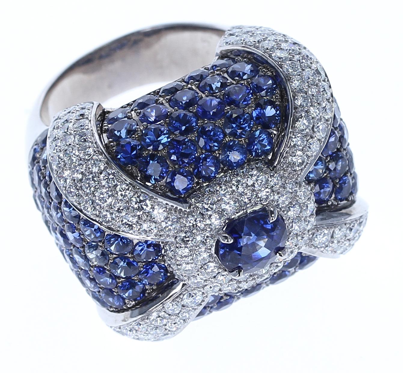 An approximate 1.27 Carat Center Sapphire Cocktail Ring with Pave Sapphires and Diamonds, 18K White Gold. 
Accent Sapphires Weight: 9.10 carats
Total Weight: 23.56 grams
Signed LEVIEV.