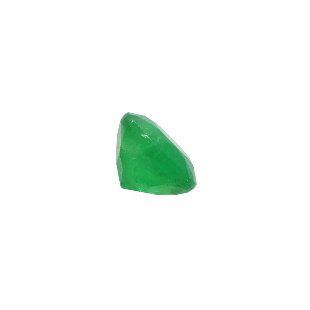 Beautiful loose round cut genuine natural emerald in 1.27 carats weight from Colombia. Its captivating medium dark green hue boasts remarkable saturation and included clarity, creating the famous grass green color that distinguishes Colombian
