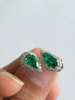 1.27 Carats, Natural Zambian Shield Shaped Emerald & Diamonds Engagement Ring