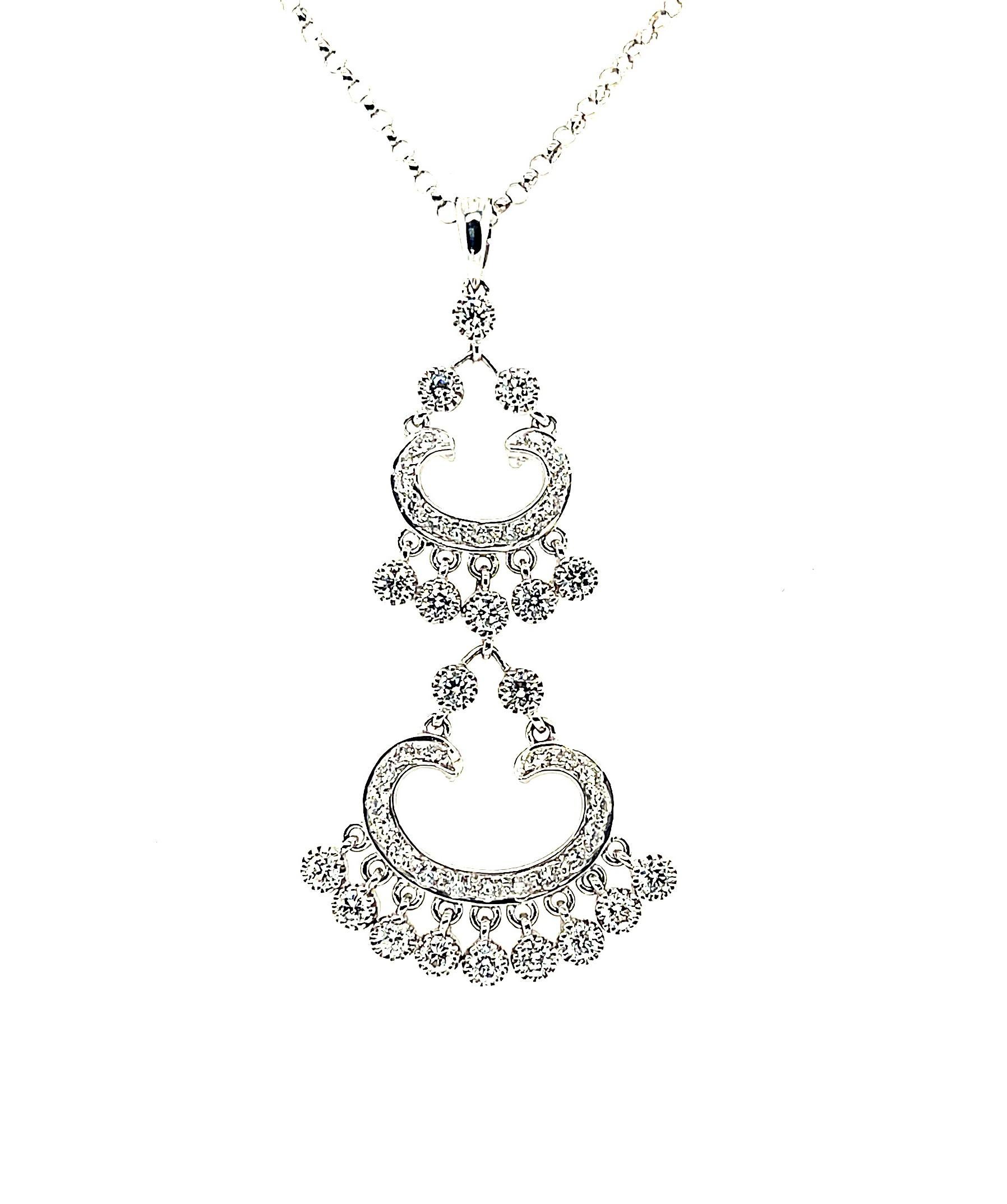 Style and grace combine to create this lacy, Victorian era inspired diamond drop pendant. The intricate design comes to life with sparkling round brilliant cut diamonds, with just enough movement to make this necklace fun to wear yet remain refined