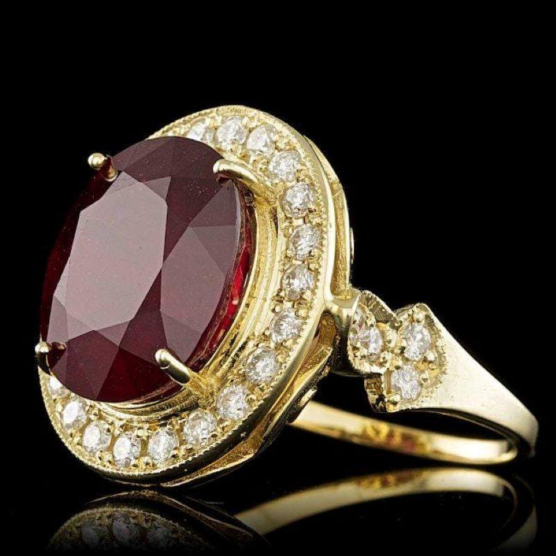 12.70 Carats Natural Red Ruby and Diamond 14K Yellow Gold Ring

Total Red Ruby Weight is: Approx. 11.80 Carats

Ruby Measures: Approx. 14.00 x 12.00mm

Ruby treatment: Fracture Filling

Natural Round Diamonds Weight: Approx. 0.90 Carats (color G-H /