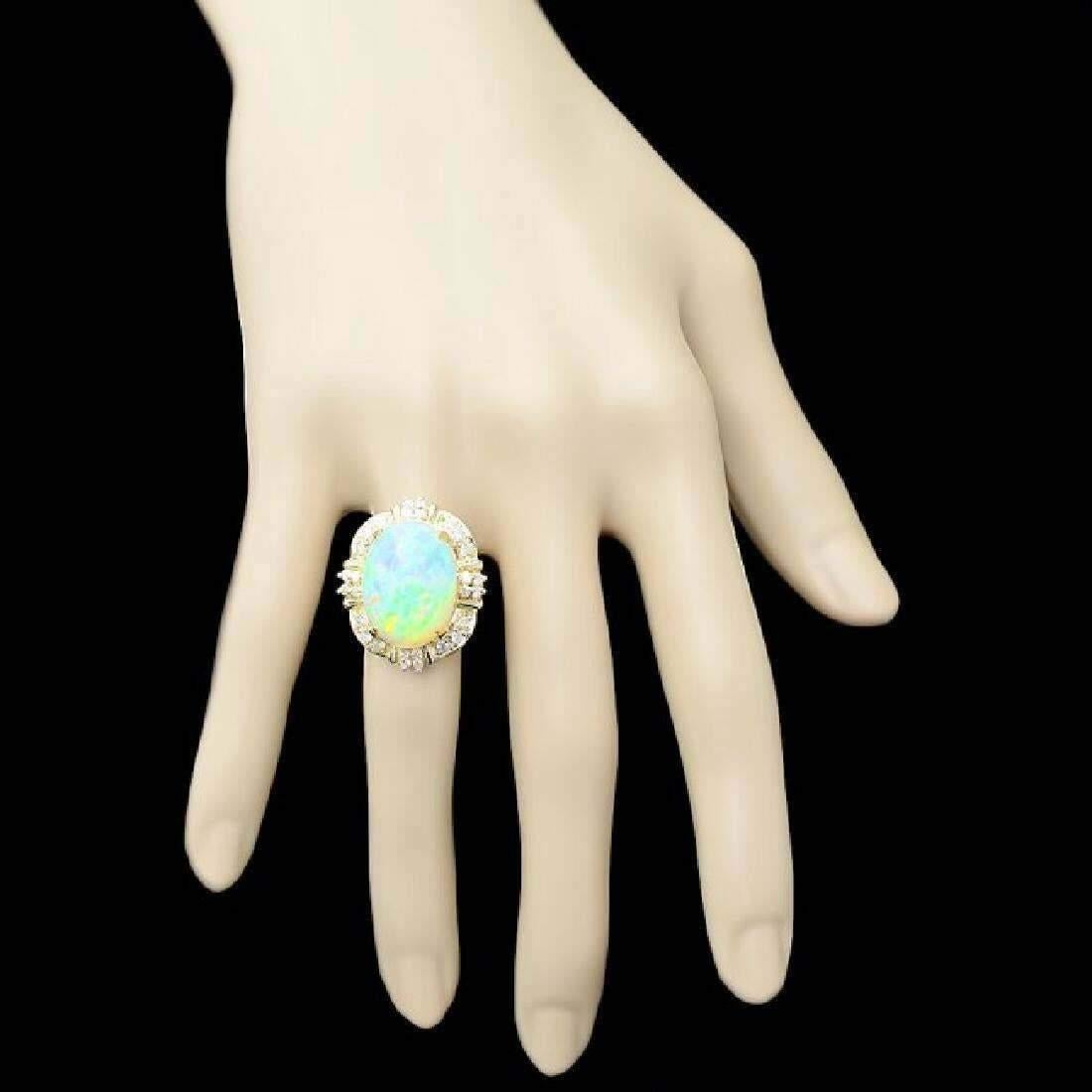 Mixed Cut 12.70 Carat Natural Ethiopian Opal and Diamond 14 Karat Solid Yellow Gold Ring For Sale
