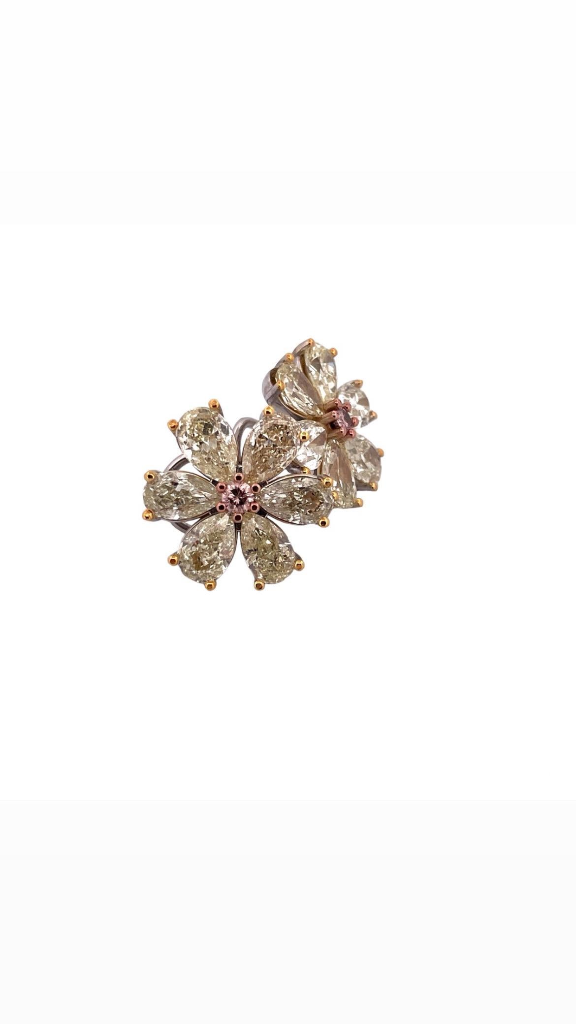 Transport yourself to a garden of dreams with our enchanting 'Rêves de Marguerite' earrings. Each delicate petal, crafted from shimmering natural Fancy Yellow Pear shape diamonds, radiates warmth and vitality, while the soft pink Diamonds at  the 
