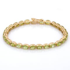 12.72 Carat Peridot Tennis Bracelet in 18K Yellow Gold