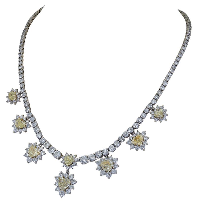 Contemporary 12.73 Carat Heart Shape Yellow Diamond Halo Drop Necklace For Sale