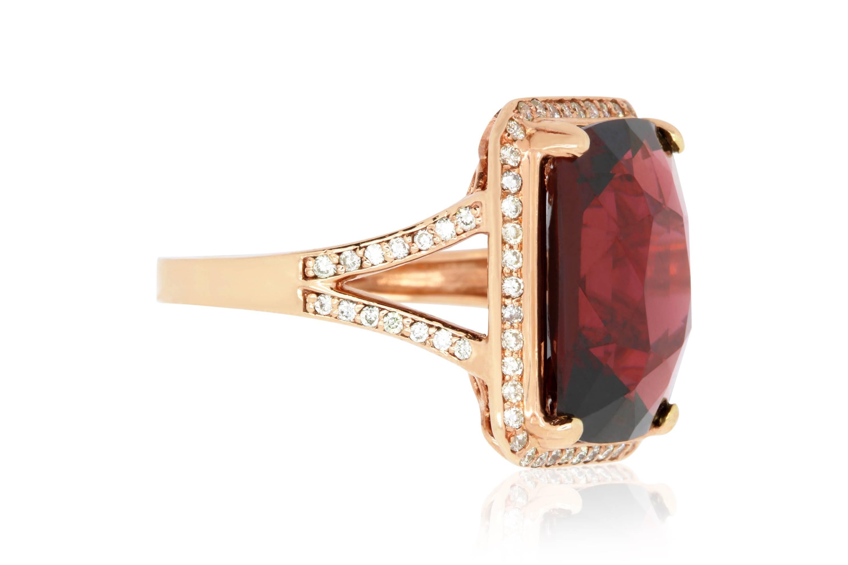 Material: 14k Rose Gold 
Center Stone Details: 12.74 Carat Rhodolite Garnet - 12.6 x 15.9 mm
Mounting Diamond Details: 72 Round White Diamonds Approximately 0.45 Carats - Clarity: SI / Color: H-I
Ring Size: Size 7 (can be sized)

Fine one-of-a kind