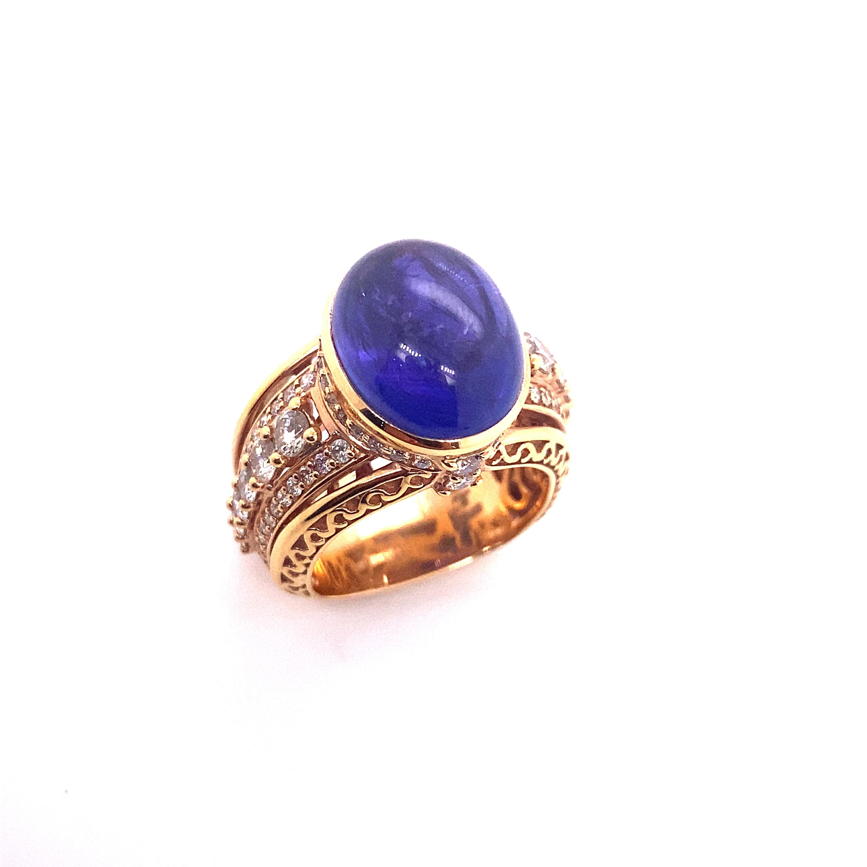 Large Tanzanite Cabochon Ring in 18 Karat Rose Gold and Diamonds

This magnificent cocktail ring features a lustrous Tanzanite cabochon richly vivid in violet-bluish hues. Tanzanite is relatively new to the colored stone galaxy. The most common