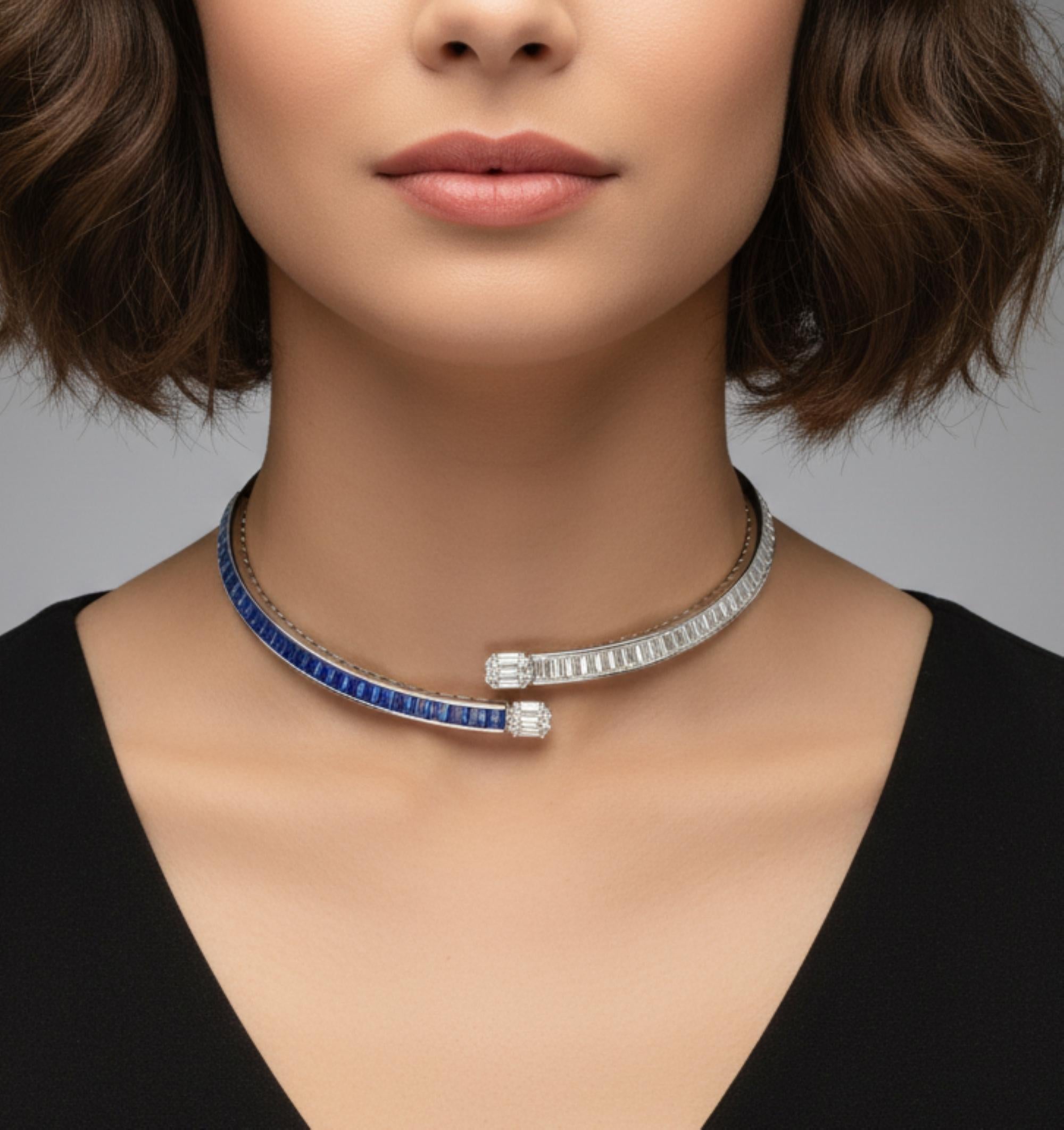 12,76 Karat Blauer Saphir 13,86 Karat SI/H Diamant 14K Weißgold Choker Halskette.
Ein wahrhaft einzigartiges Stück, das die zeitgenössische Eleganz neu definiert. Diese Halskette im offenen Stil zeichnet sich durch ein schlankes Bypass-Design aus,
