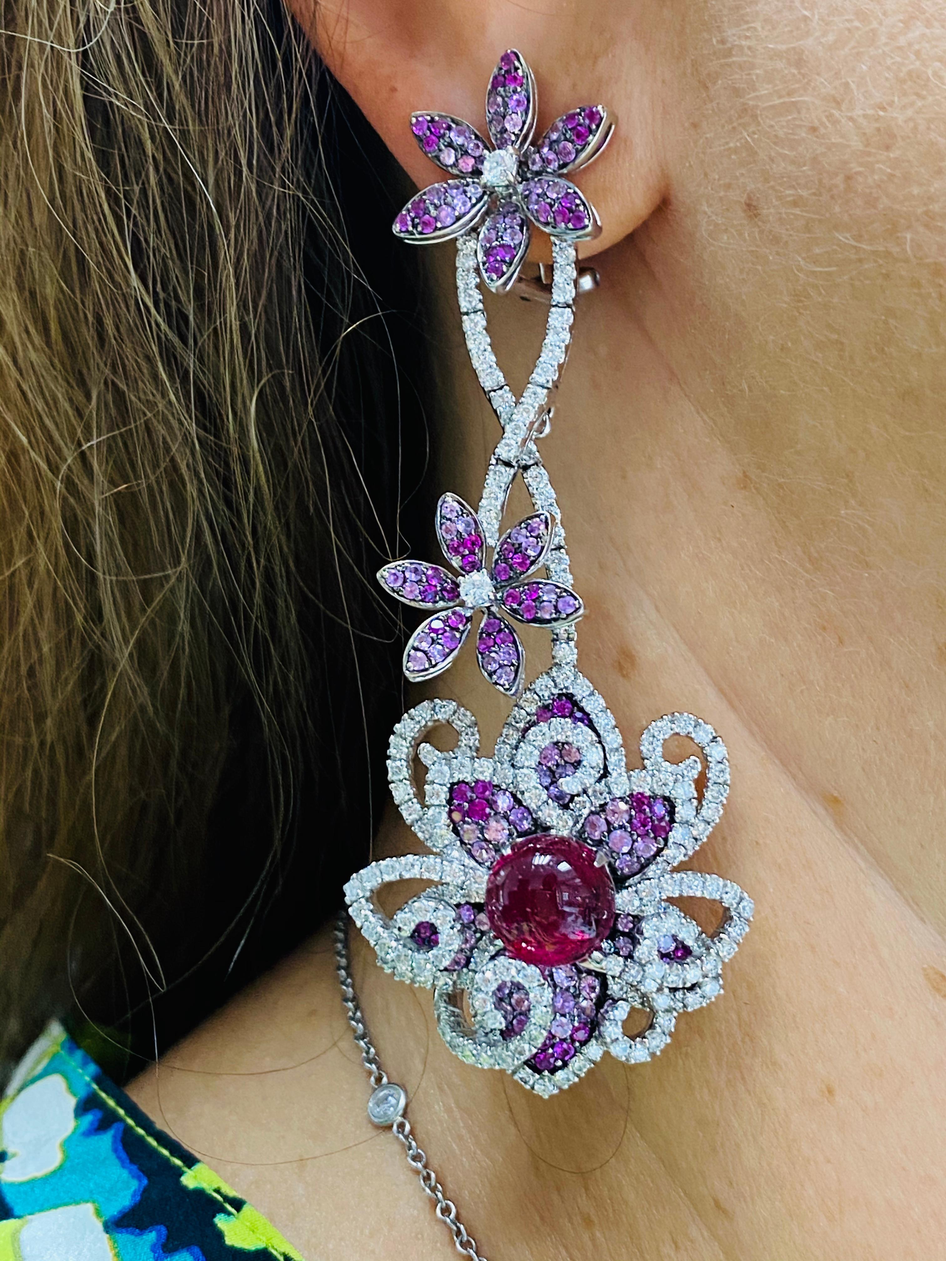 Magnificent Ruby and Diamond Earrings, designed by Diana M. Jewels. 
Features 12.76 Carats of rubies and pink sapphires, surrounded by 5.57 carats of diamonds. 

