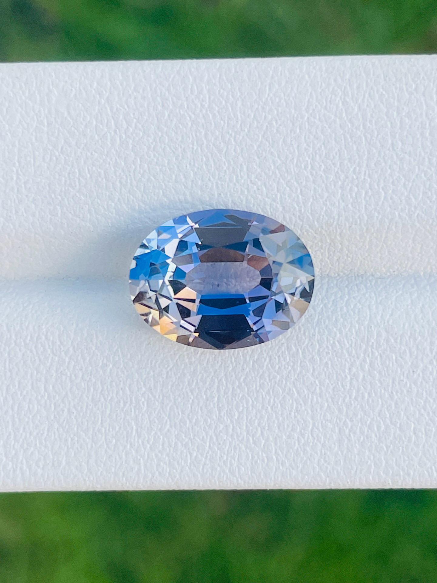 GIT-Zertifikat natürlicher unerhitzter Tansanit Metallic-Lila  6,96 Ct (Brillantschliff) im Angebot