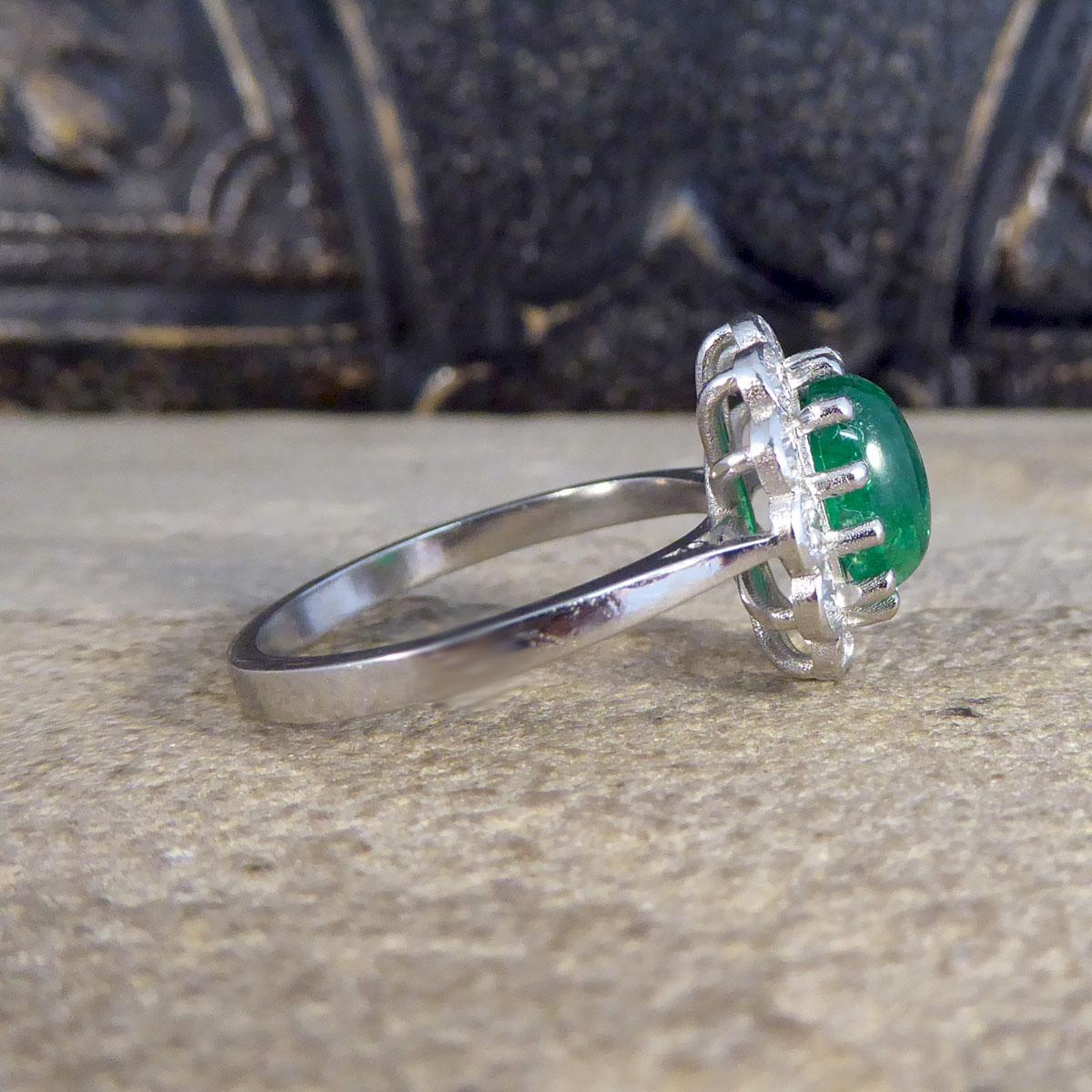 Contemporary 1.27ct Cabochon Emerald and 1.02ct Diamond Cluster Ring in Platinum For Sale