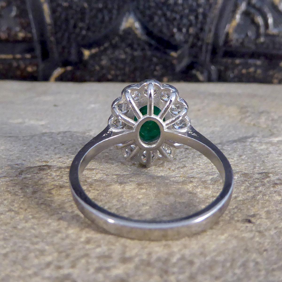 1.27ct Cabochon Emerald and 1.02ct Diamond Cluster Ring in Platinum In Good Condition For Sale In Yorkshire, West Yorkshire