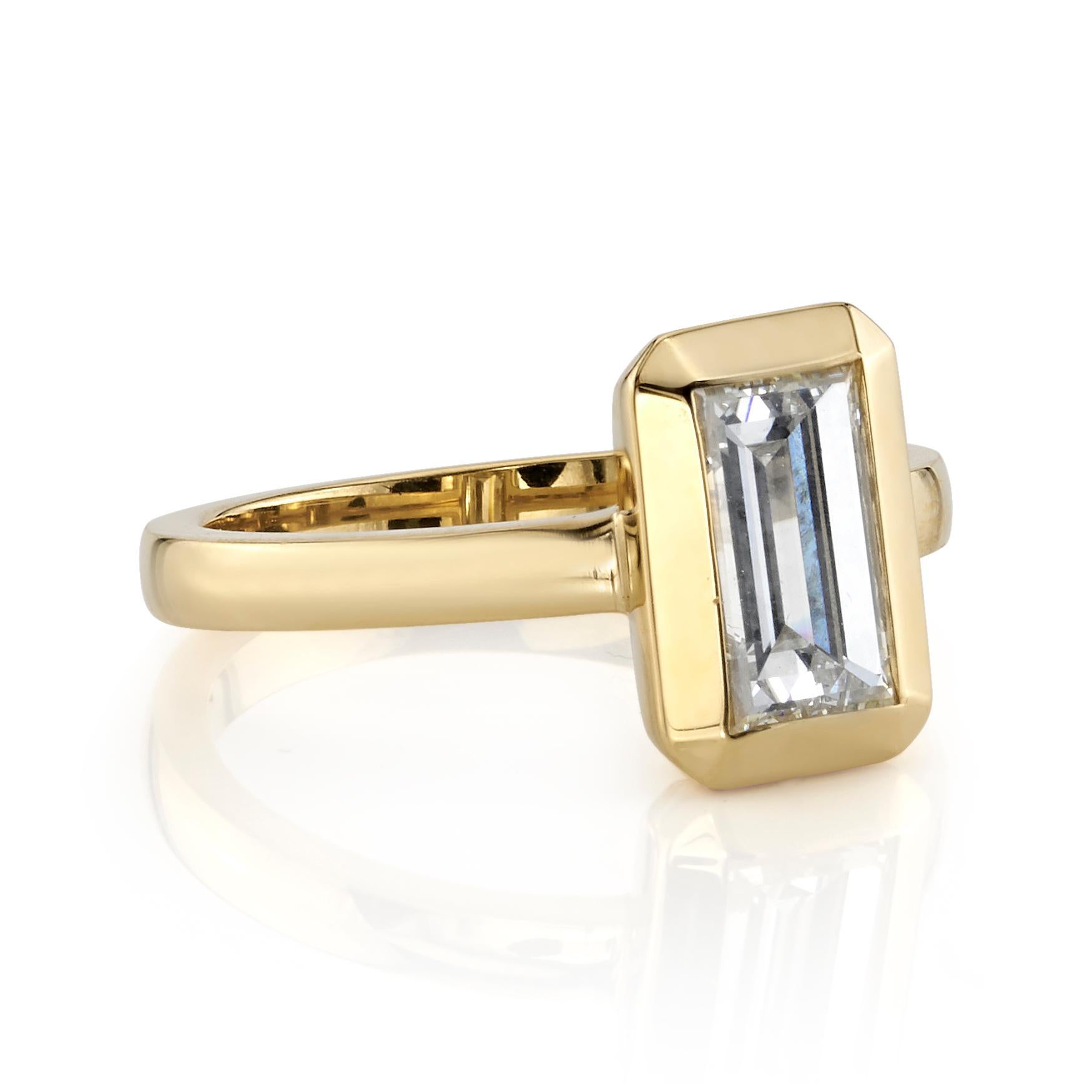 1.27ct I/VS2 GIA certified rectangular step cut diamond set in a handcrafted 18K yellow gold mounting. 

