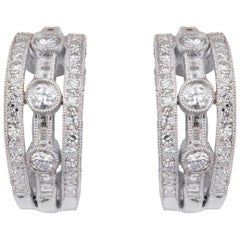 Boucle d'oreille en or avec diamant de 1,27cts