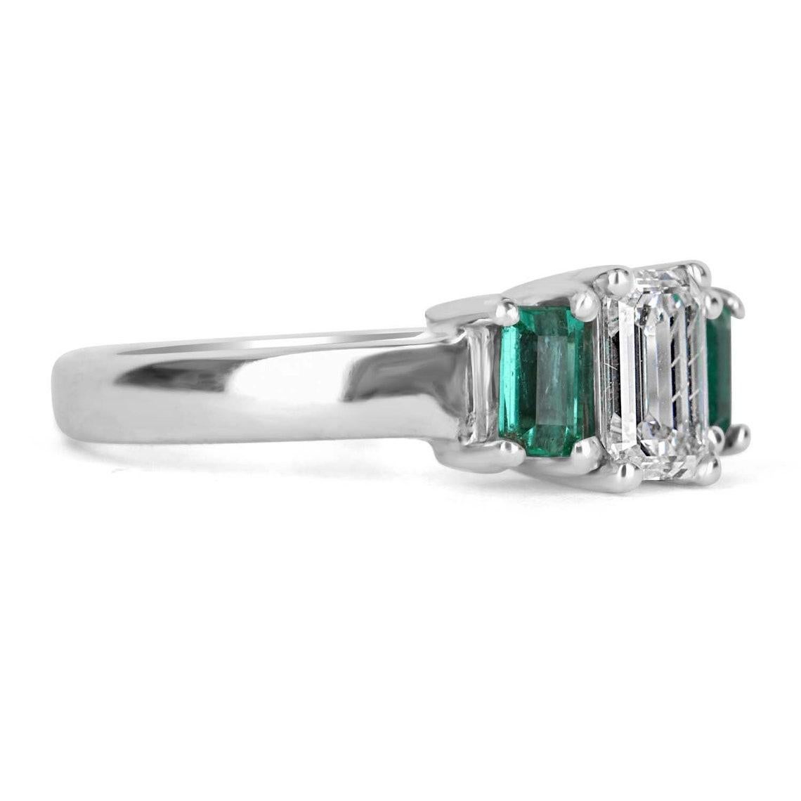 A diamond and Colombian emerald three stone engagement or right-hand ring. An extraordinary custom-created ring. Designed and created by our own master jeweler, 