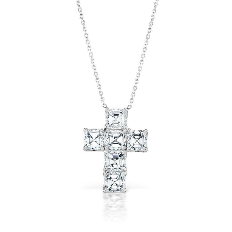 Timeless and Fine Diamond Cross. 
6 Asscher Cut Diamonds of F-G color and VS clarity totaling 1.28 Carats.
Set in 18 Karat White Gold..
Measures 16 inches.