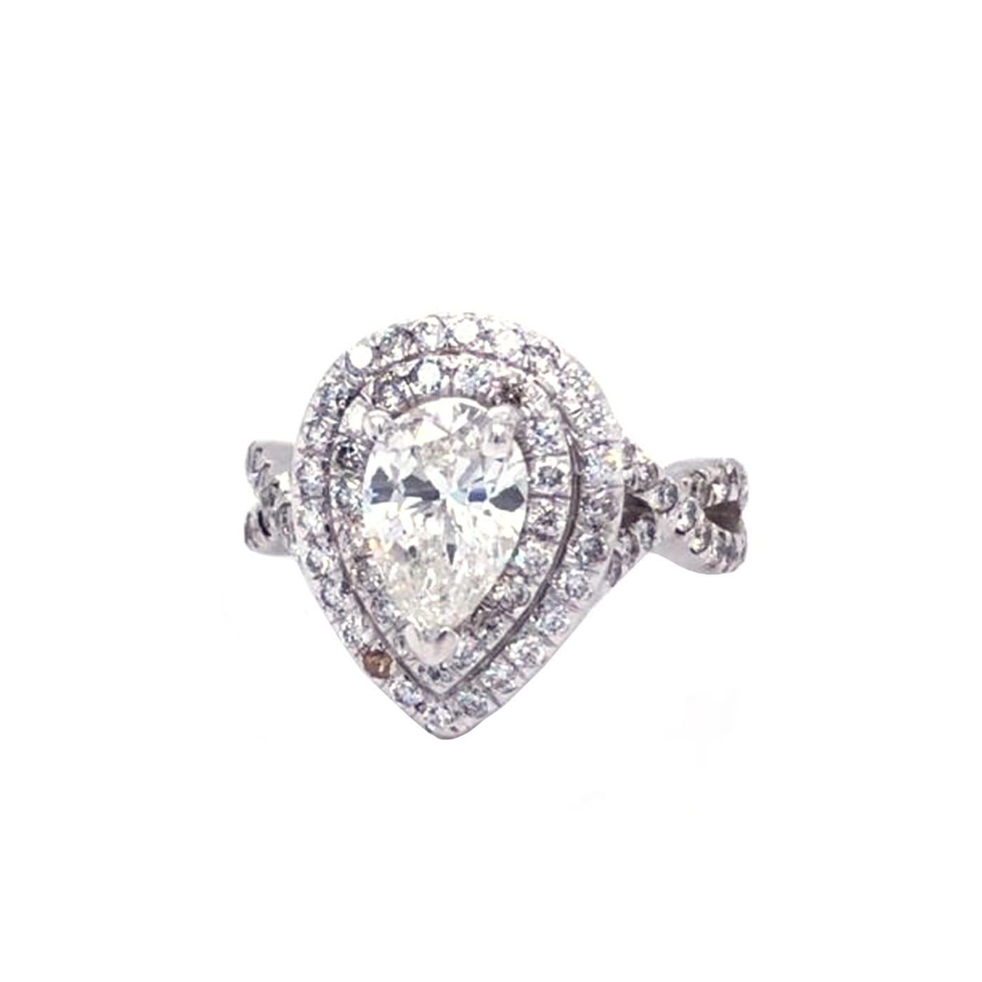 Classic Diamond ring, Sparkling, Pear brilliant-cut natural 1.28-carat center diamond encased with 3 prongs, accented round brilliant cut diamonds on the shoulder and two rows framing the center diamond, Beautiful handcrafted design set in high