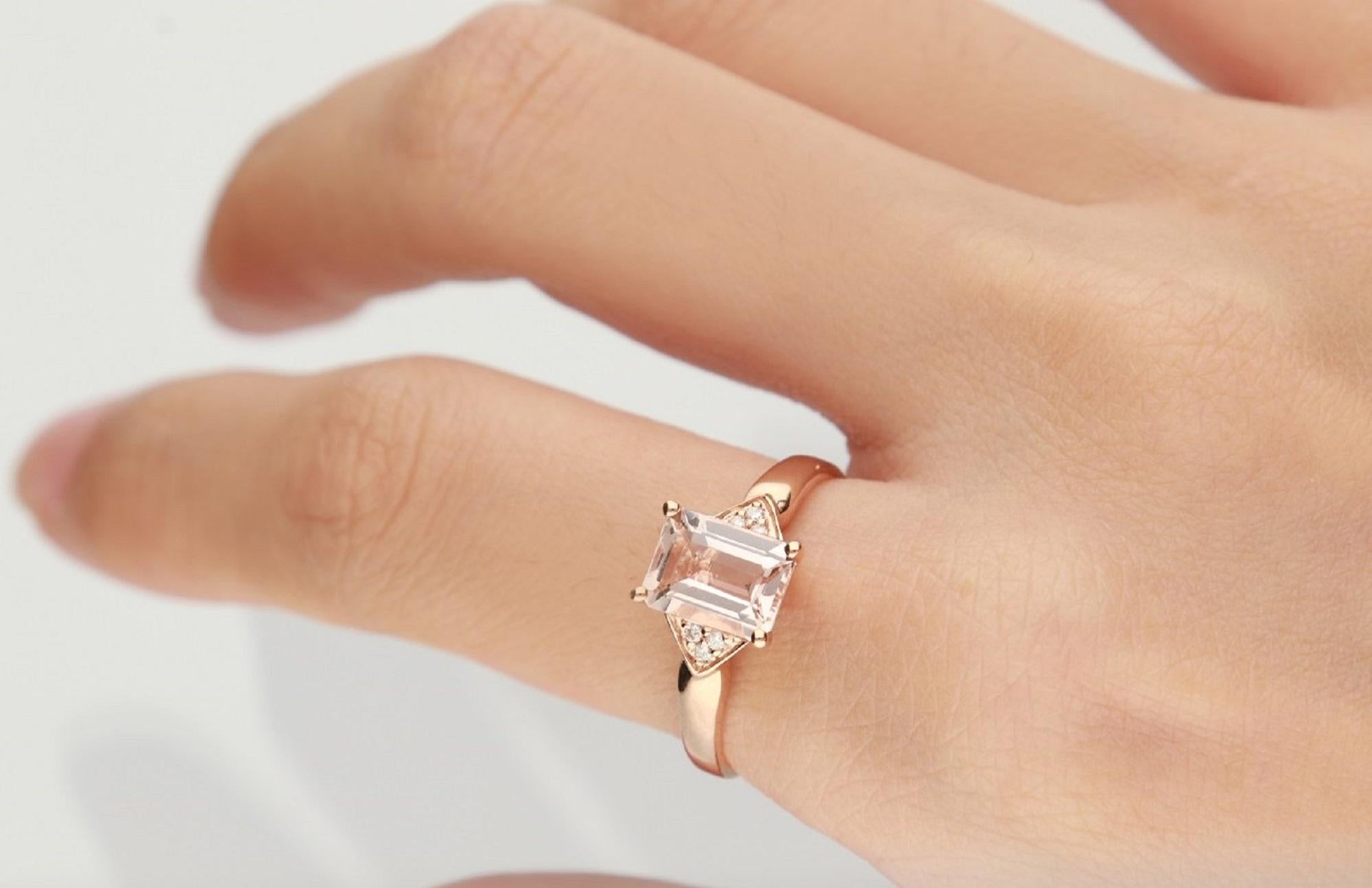 Decorate yourself in elegance with this Ring is crafted from 14-karat Rose Gold by Gin & Grace. This Ring is made up of 6x8 mm Emerald-Cut (1 pcs) 1.28 carat Morganite and Round-cut White Diamond (6 Pcs) 0.04 Carat. This Ring is weight 1.80 grams.